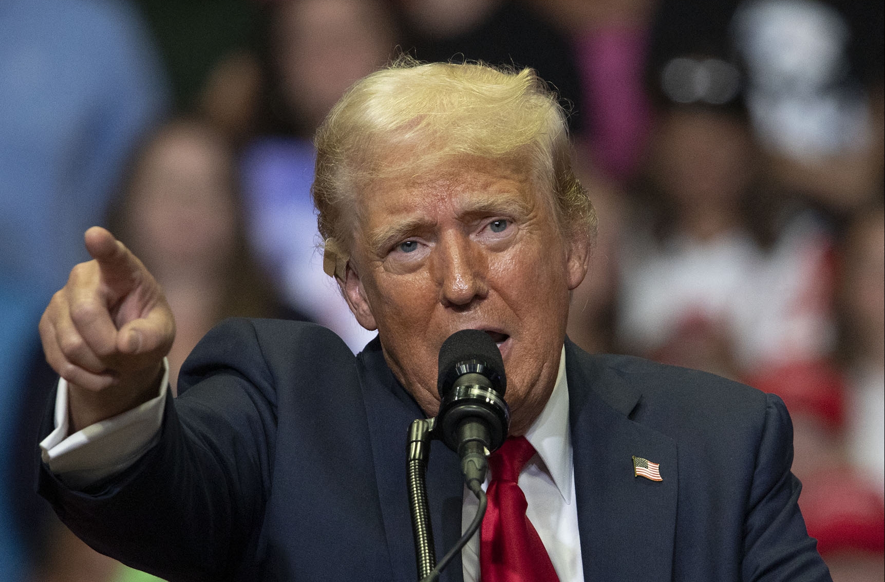 GRAND RAPIDS, MICHIGAN - JULY 20: Republican Presidential nominee former President Donald J. Trump holds his first public campaign rally with his running mate, Vice Presidential nominee U.S. Senator J.D. Vance (R-OH) (not pictured), at the Van Andel Arena on July 20, 2024 in Grand Rapids, Michigan. This is also Trump's first public rally since he was shot in the ear during an assassination attempt in Pennsylvania on July 13. Photo by Bill Pugliano/Getty Images) (Photo by BILL PUGLIANO / GETTY IMAGES NORTH AMERICA / Getty Images via AFP)