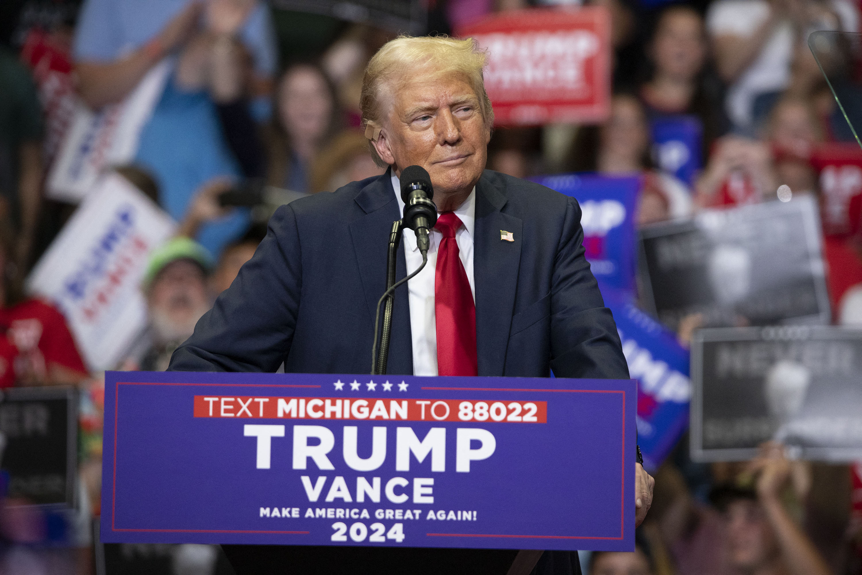 GRAND RAPIDS, MICHIGAN - JULY 20: Republican Presidential nominee former President Donald J. Trump holds his first public campaign rally with his running mate, Vice Presidential nominee U.S. Senator J.D. Vance (R-OH) (not pictured), at the Van Andel Arena on July 20, 2024 in Grand Rapids, Michigan. This is also Trump's first public rally since he was shot in the ear during an assassination attempt in Pennsylvania on July 13. Photo by Bill Pugliano/Getty Images) (Photo by BILL PUGLIANO / GETTY IMAGES NORTH AMERICA / Getty Images via AFP)