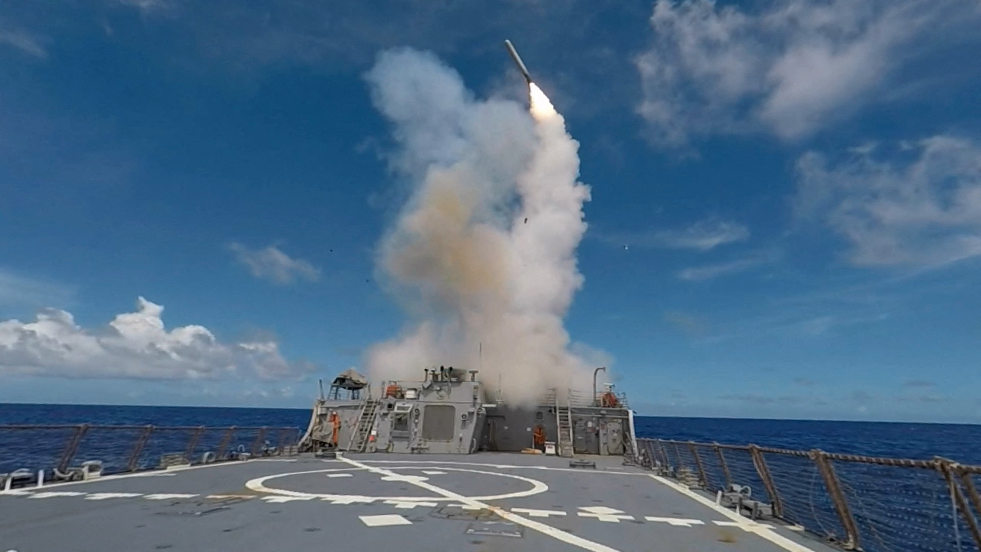 (FILES) This file handout image obtained from the US Navy and taken on September 20, 2016 shows a Tomahawk Missile being launched from the Arleigh Burke-class guided-missile destroyer USS Stethem during the biennial Valiant Shield field-training exercise. The United States' plan to periodically station long-range missiles in Germany will lead to Cold War-style confrontation between Russia and the West, the Kremlin said on July 11, 2024. The White House announced the decision on July 10 during a NATO summit in Washington, arguing the stationing of long-range weapons including Tomahawk cruise missiles in Europe acts as a deterrent. (Photo by Jaret MORRIS / US NAVY / AFP) / RESTRICTED TO EDITORIAL USE - MANDATORY CREDIT "AFP PHOTO / US NAVY / COMMAND MASTER CHIEF JARET MORRIS" - NO MARKETING NO ADVERTISING CAMPAIGNS - DISTRIBUTED AS A SERVICE TO CLIENTS