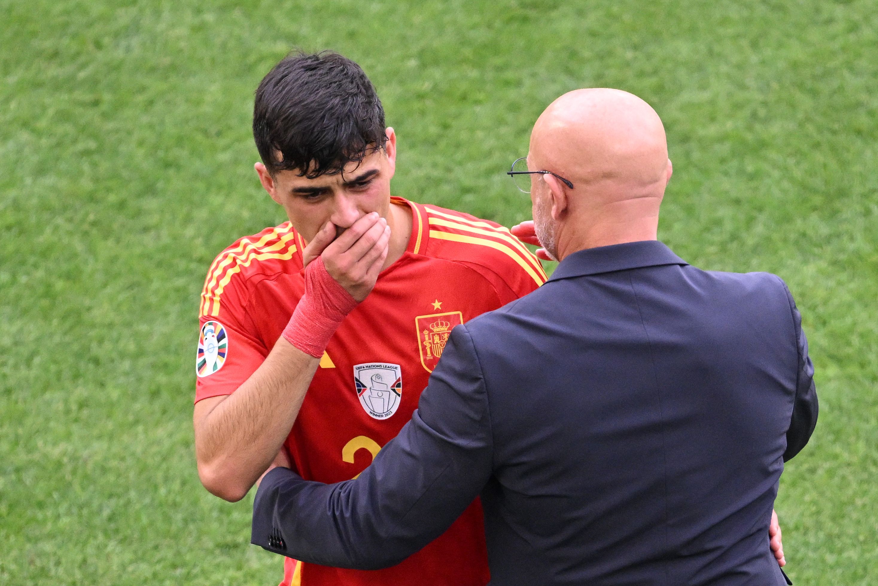 Spain's midfielder #20 Pedri leaves the pitch after being injured during the UEFA Euro 2024 quarter-final football match between Spain and Germany at the Stuttgart Arena in Stuttgart on July 5, 2024. (Photo by Kirill KUDRYAVTSEV / AFP)