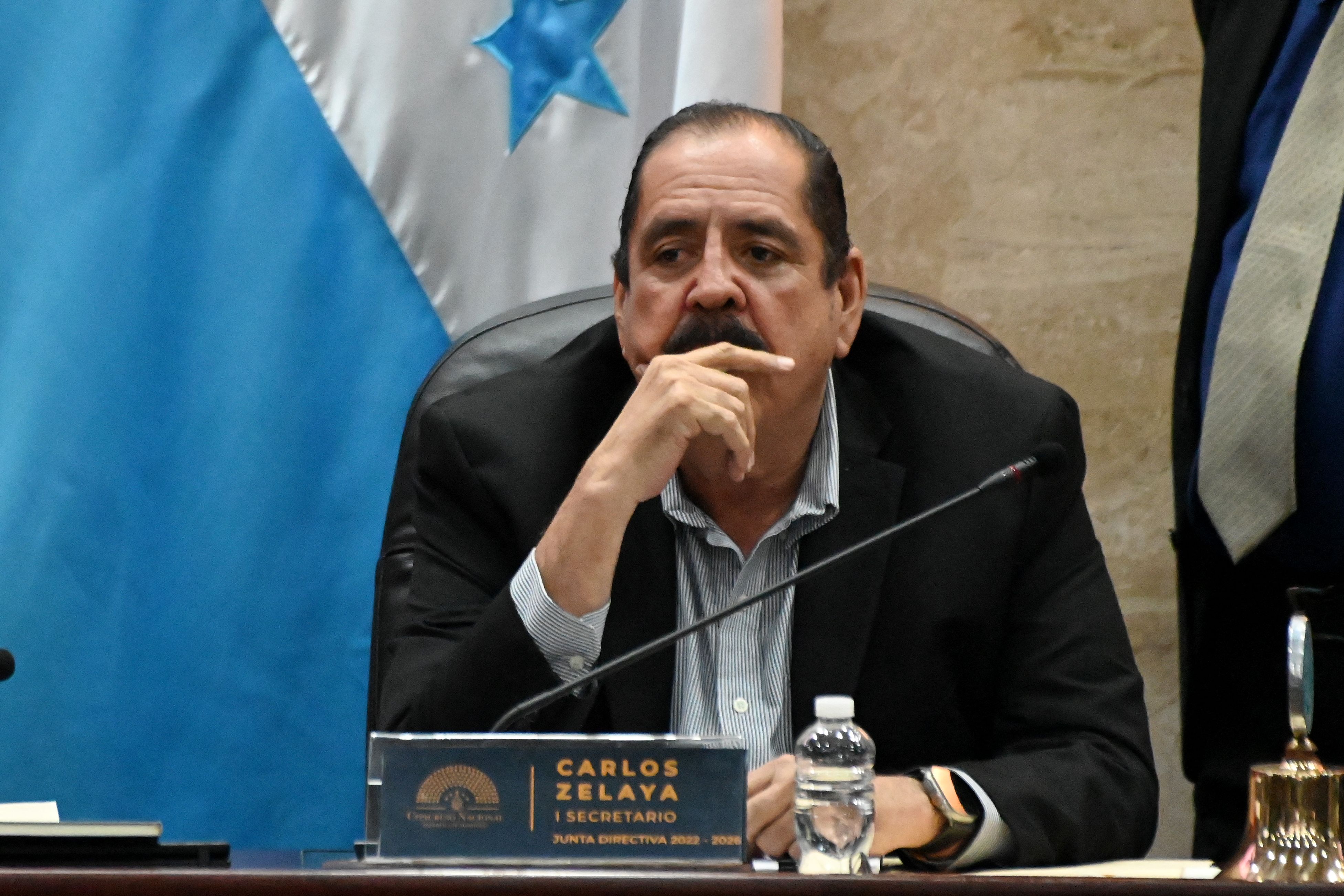 The Secretary of the Honduran Congress, Carlos Zelaya gestures during a session of the Legislative Chamber in Tegucigalpa on January 16, 2024. The secretary of the Honduran Congress, Carlos Zelaya, brother-in-law of President Xiomara Castro, said Saturday that he will resign from his post to be investigated for alleged links to drug trafficking. (Photo by Orlando SIERRA / AFP)