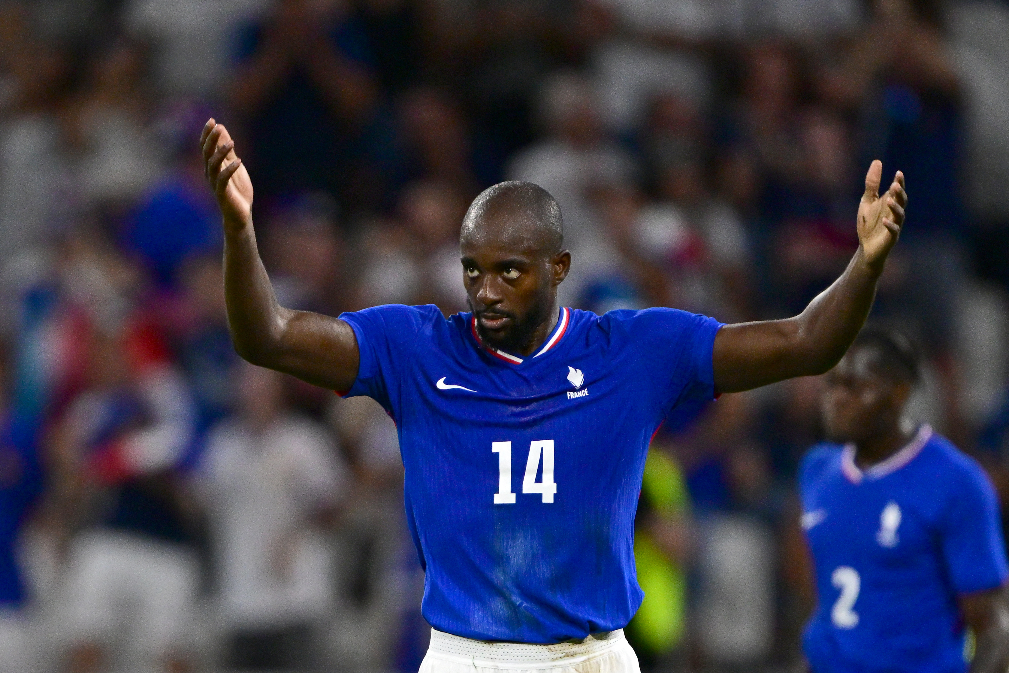 France's forward #14 Jean-Philippe Mateta celebrates scoring his team's first goal during the men's semi-final football match between France and Egypt during the Paris 2024 Olympic Games at the Lyon Stadium in Lyon on August 5, 2024. (Photo by Olivier CHASSIGNOLE / AFP)