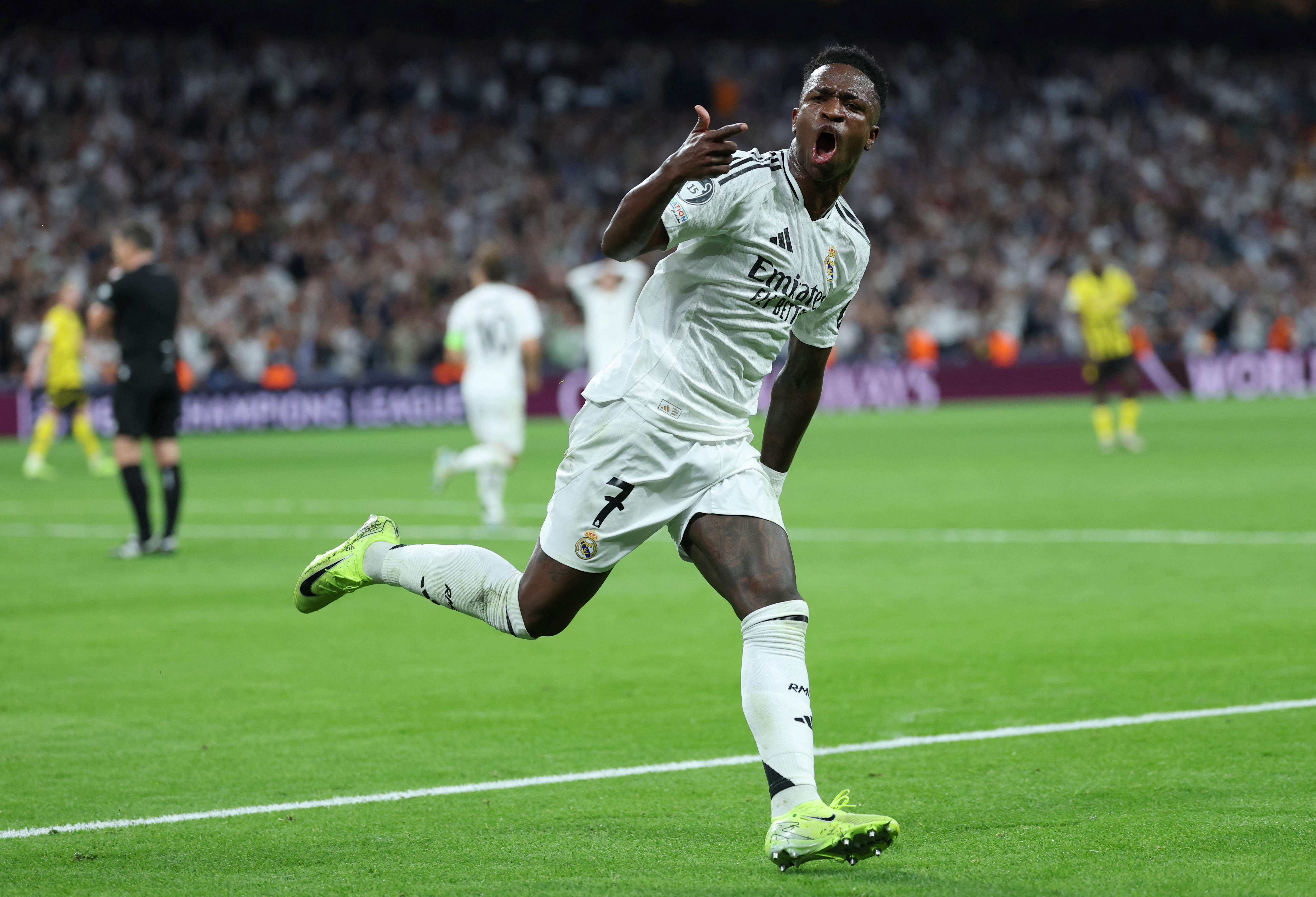 Vinícius Junior celebra uno de sus dos goles ante el Dortmund.