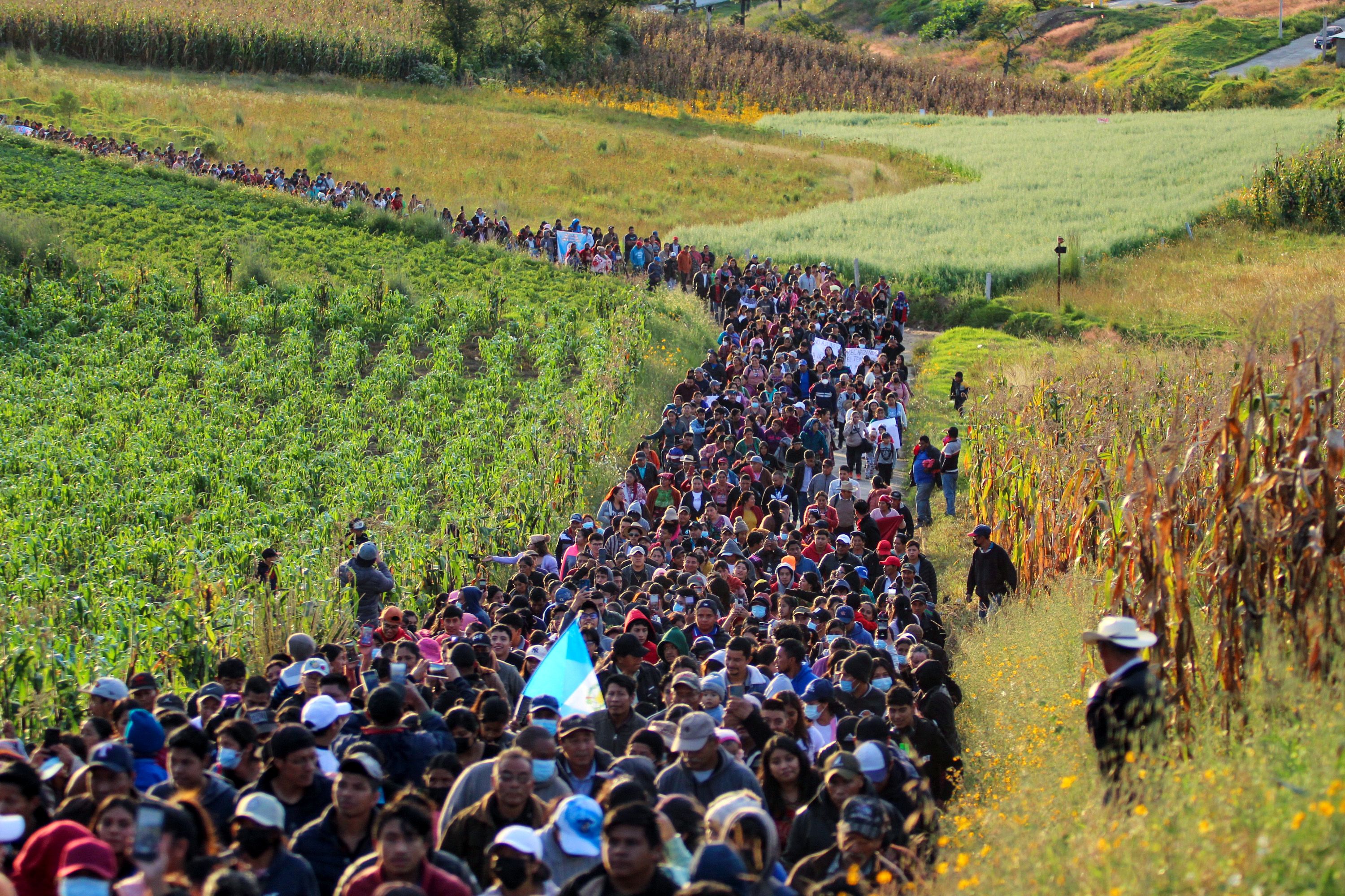 TOPSHOT - Indigenous people take part in a protest against the construction of a 'Templo Santa Muerte' in Cantel, Guatemala, on October 26, 2024. Protesters reject the prayer center because they consider it to be built by gang members who are imprisoned in the jail of that place. (Photo by Gustavo RODAS / AFP)