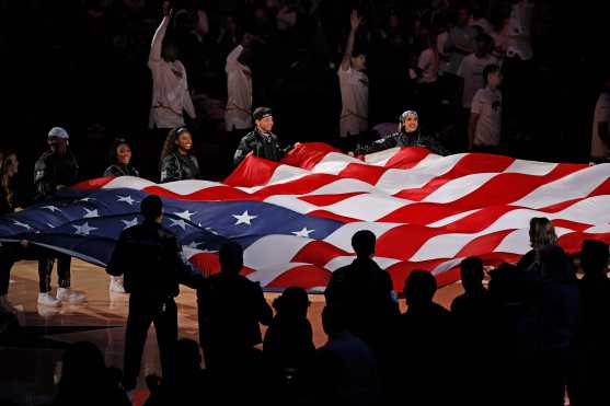 SAN ANTONIO, TX - NOVEMBER 23: The United States flag is on display before the start of the first half of the game between the San Antonio Spurs and the Golden State Warriors at Frost Bank Center on November 23, 2024 in San Antonio, Texas. NOTE TO USER: User expressly acknowledges and agrees that, by downloading and or using this photograph, User is consenting to terms and conditions of the Getty Images License Agreement.   Ronald Cortes/Getty Images/AFP (Photo by Ronald Cortes / GETTY IMAGES NORTH AMERICA / Getty Images via AFP)