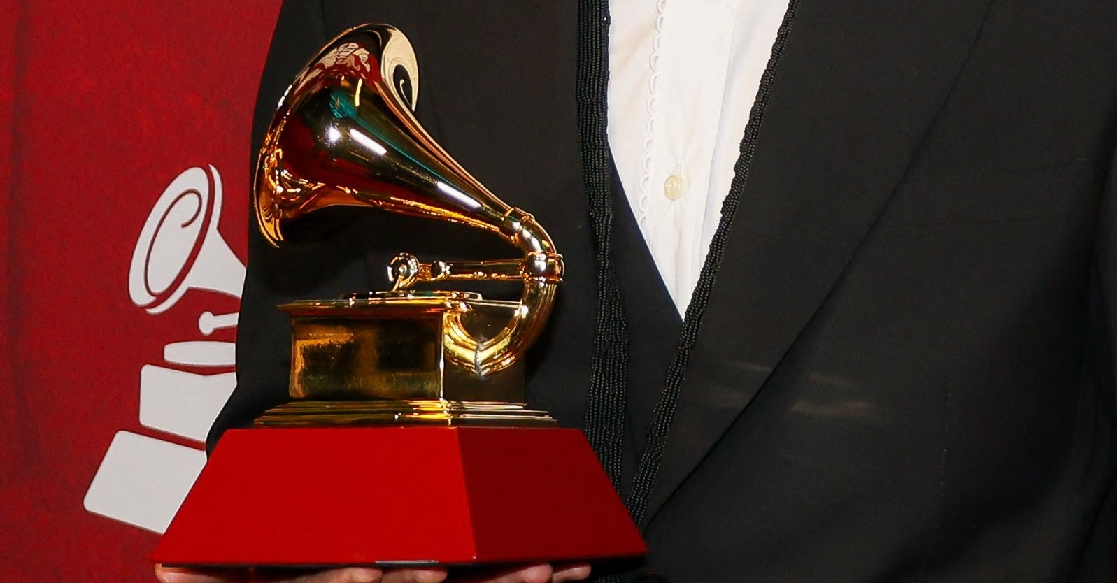 Argentine record producer/songwriter Bizarrap poses in the press room with the award for Best Latin Electronic Music Performance for "Bzrp Music Sessions, Vol. 53 (Tiësto Remix)" during the 25th Annual Latin Grammy Awards at the Kaseya Center in Miami, Florida, on November 14, 2024. (Photo by Zak BENNETT / AFP)