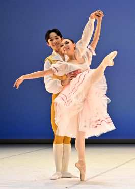 South Korean Eunseo Kim and Eunseong Jung present their programme on the stage of the National Dance Theatre in Budapest on November 21, 2024, during the final of the Budapest Ballet Grand Prix. (Photo by ATTILA KISBENEDEK / AFP)