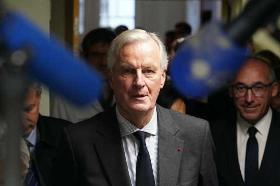 French Prime Minister Michel Barnier visits the "House of Women of the AP-HP" ("Maison des Femmes de l'Assistance Publique - Hopitaux de Paris") in Paris, on November 25, 2024 as part of the International Day for the Elimination of Violence Against Women. (Photo by Dimitar DILKOFF / AFP)