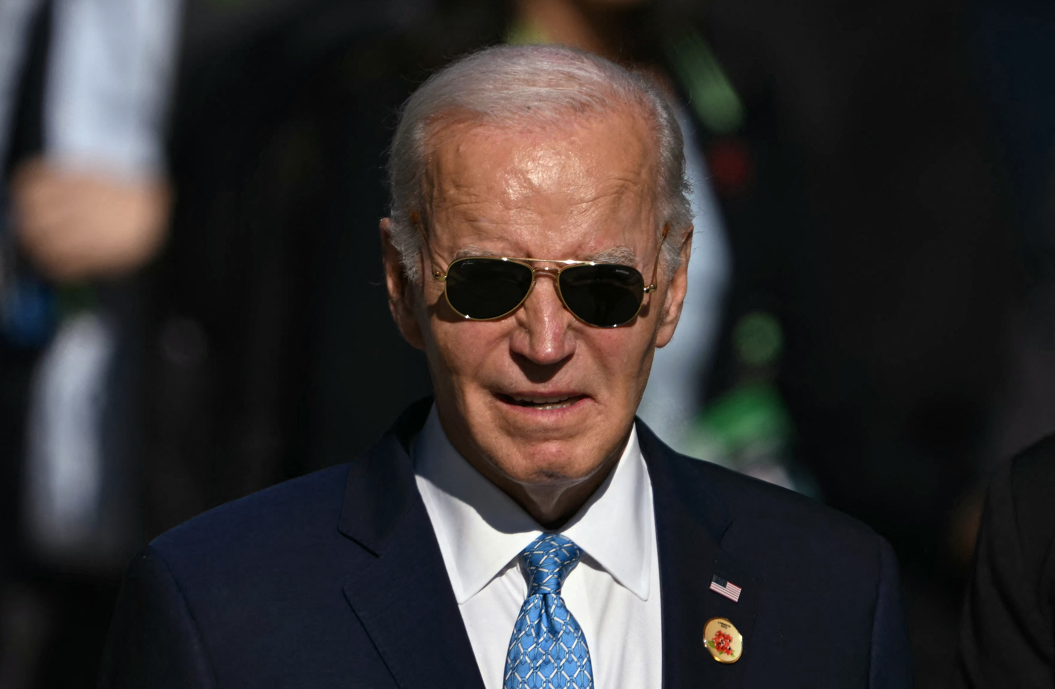 US President Joe Biden is pictured after the group photo at the end of the first session of the G20 Leaders' Meeting in Rio de Janeiro, Brazil, on November 18, 2024. (Photo by Mauro PIMENTEL / AFP)