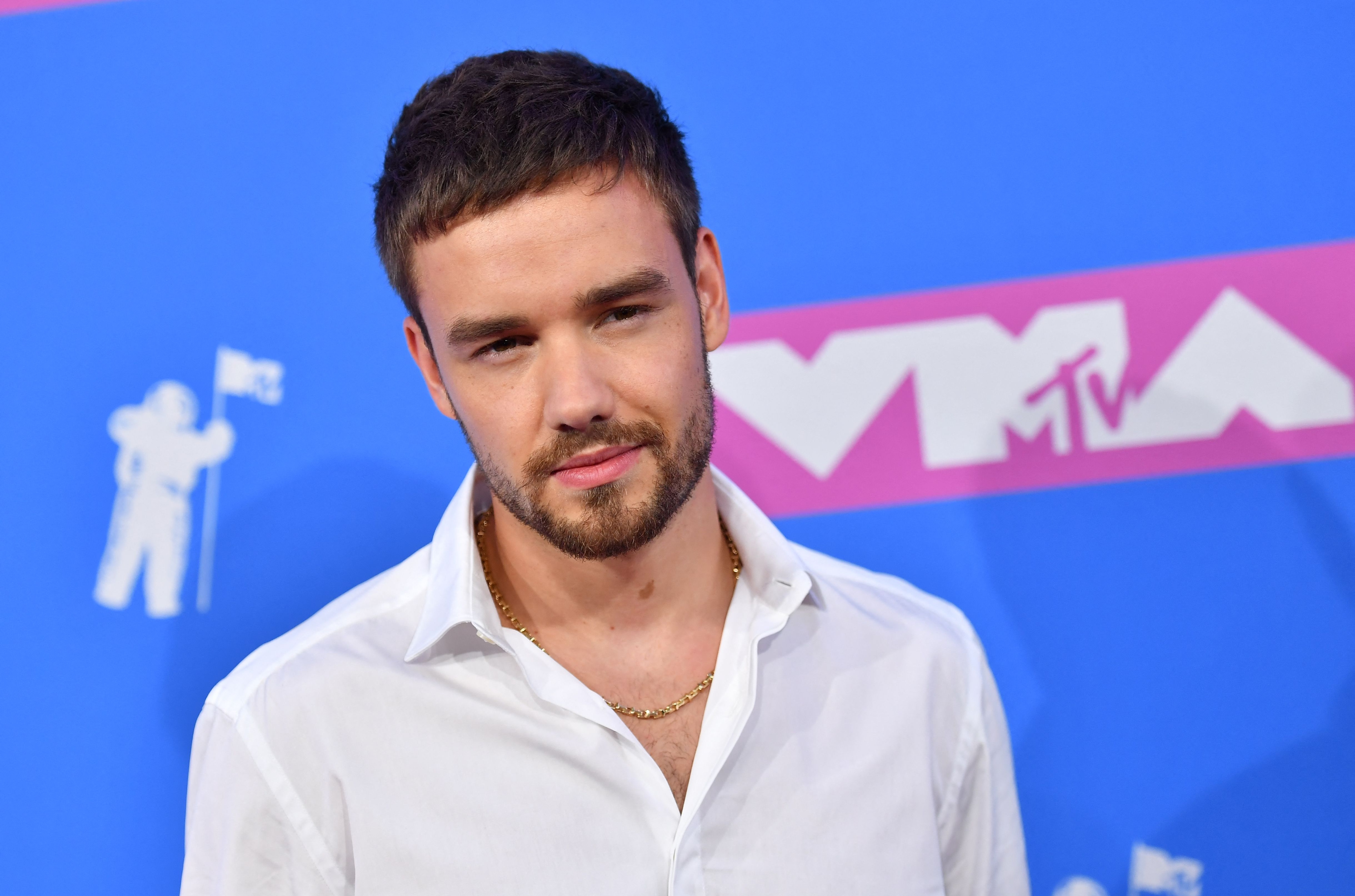 (FILES) English singer Liam Payne attends the 2018 MTV Video Music Awards at Radio City Music Hall on August 20, 2018 in New York City. The father of former One Direction star Liam Payne, who fell to his death from a Buenos Aires hotel balcony on October 16, 2024, began repatriating the singer's body to Britain on Wednesday, a police source told AFP on November 6, 2024. (Photo by ANGELA WEISS / AFP)