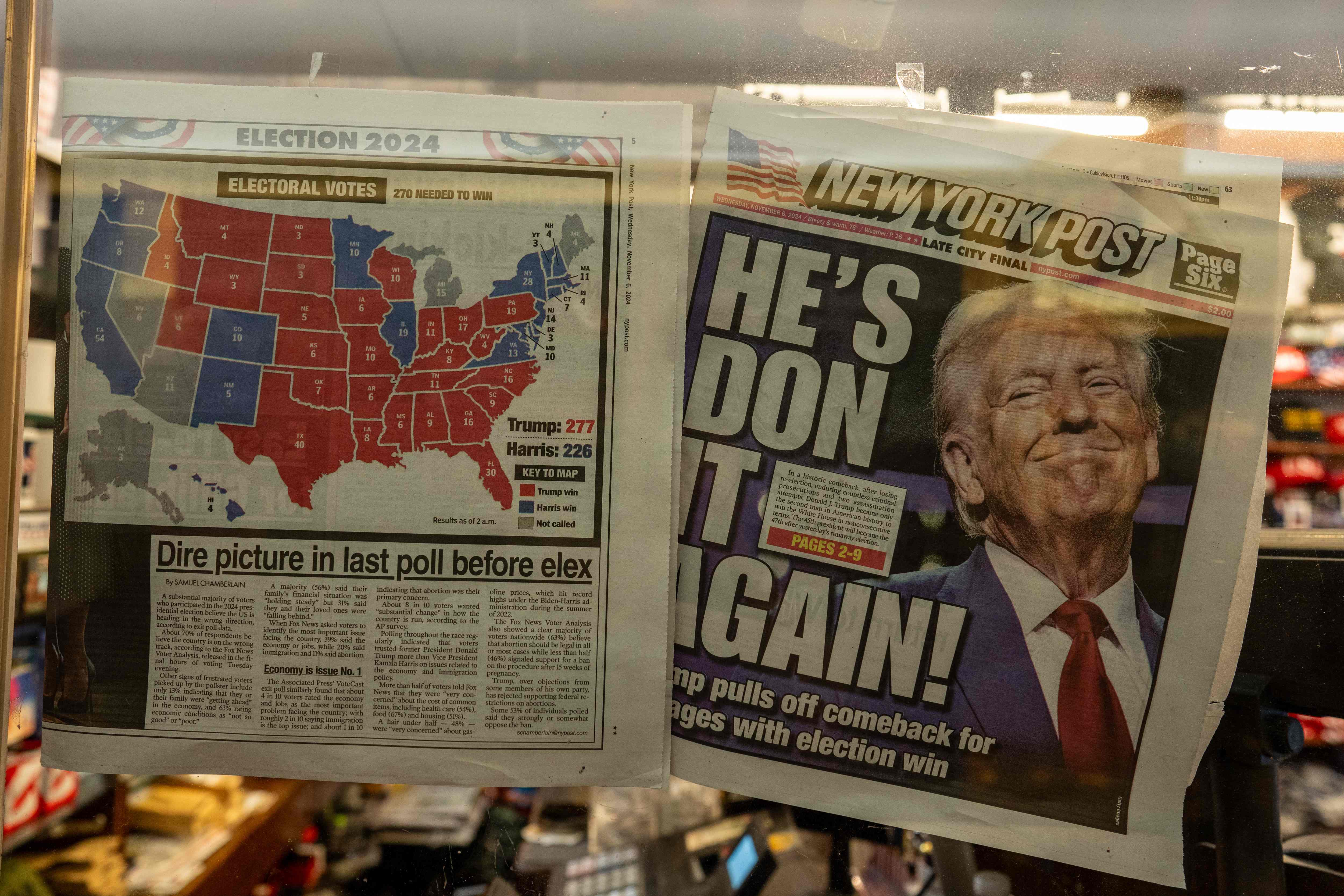 The New York Post is displayed in the window of a newsstand inside of Trump Tower in New York City, November 6, 2024. Donald Trump won a sweeping victory Wednesday in the US presidential election, defeating Kamala Harris to complete an astonishing political comeback that sent shock waves around the world. (Photo by David Dee Delgado / AFP)