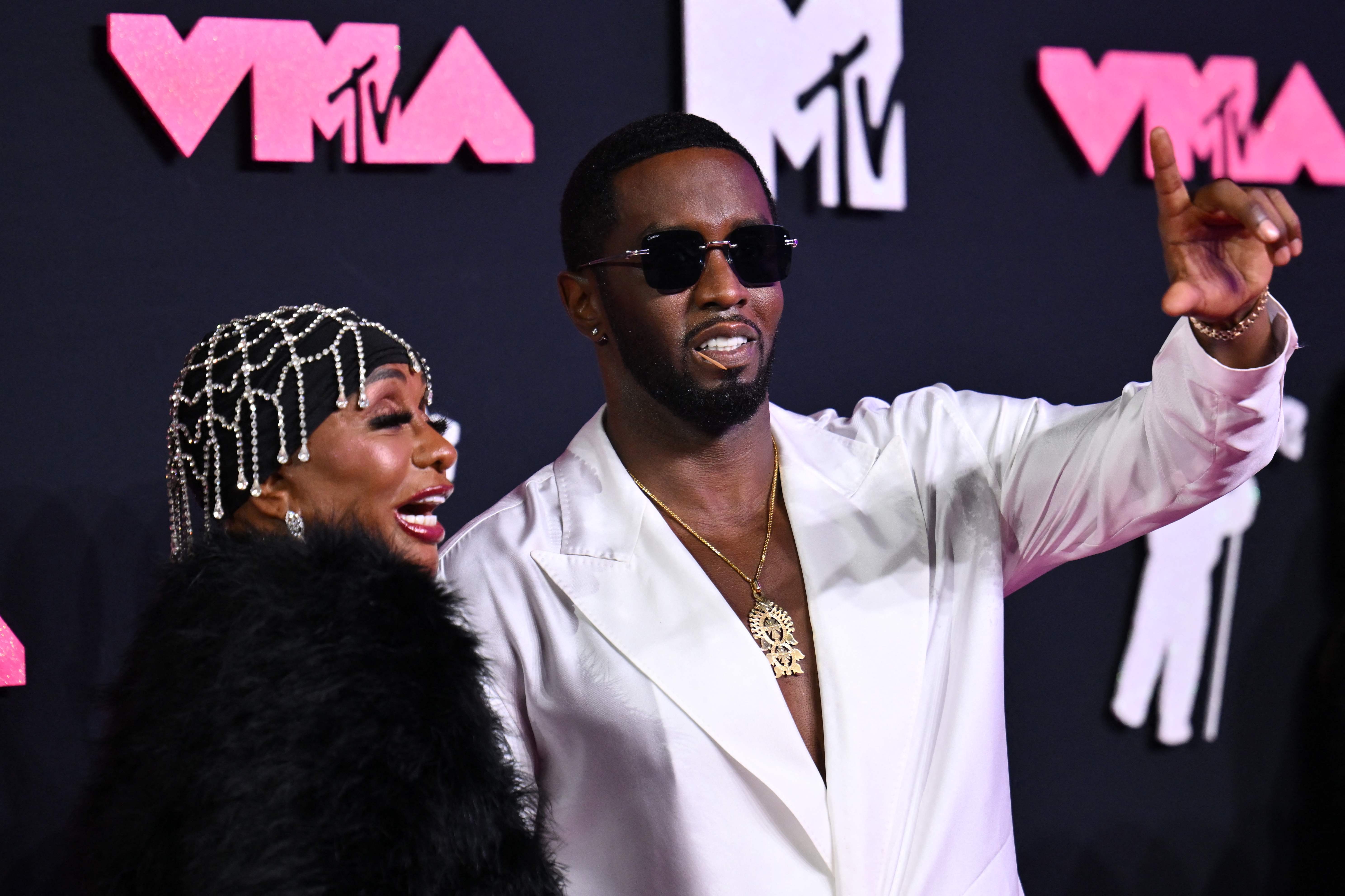 US rapper Sean Combs (R) arrives for the MTV Video Music Awards at the Prudential Center in Newark, New Jersey, on September 12, 2023. (Photo by ANGELA WEISS / AFP)