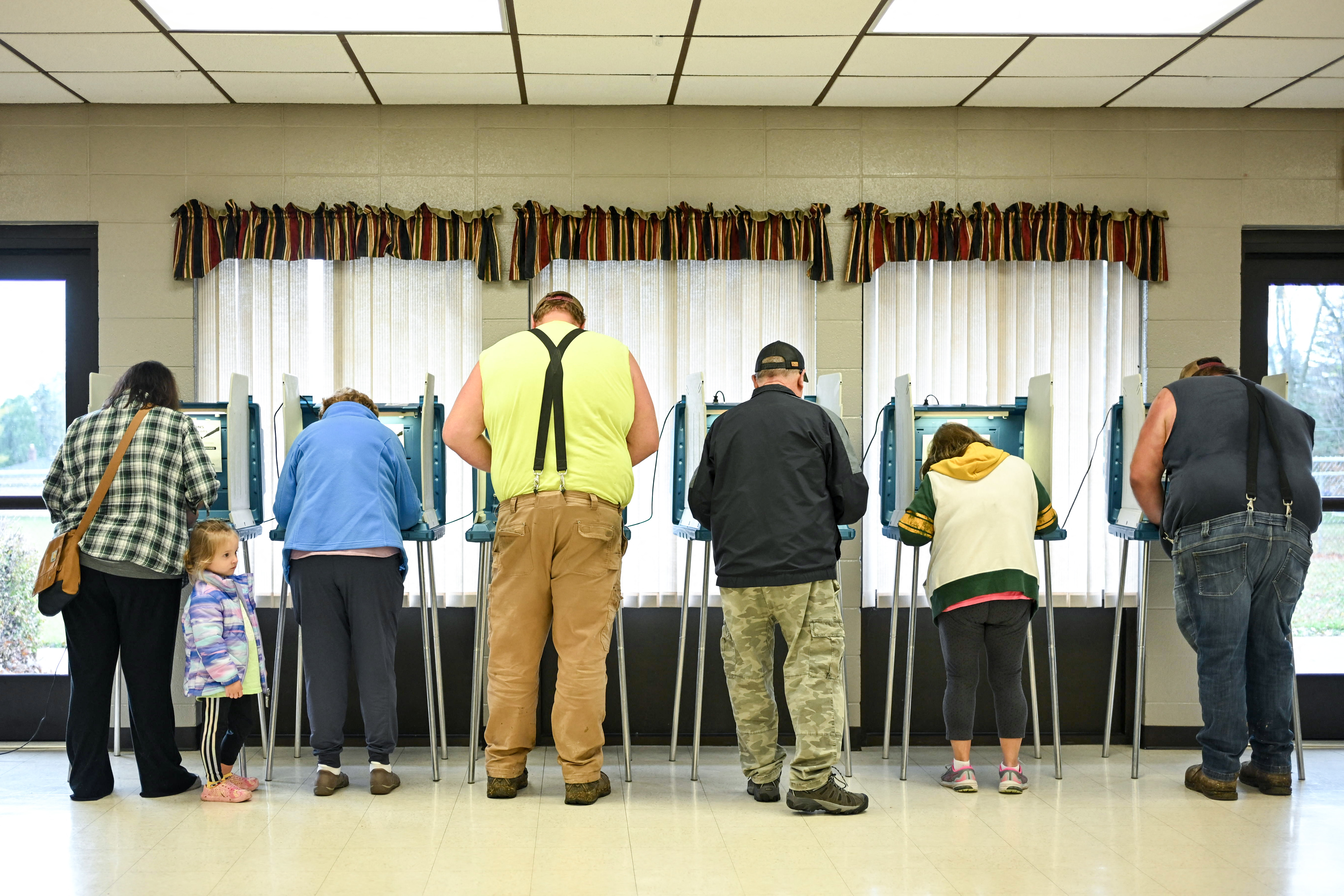 People vote at a polling station at Addison Town Hall in Allenton, Wisconsin, on Election Day, November 5, 2024. (Photo by Alex Wroblewski / AFP)