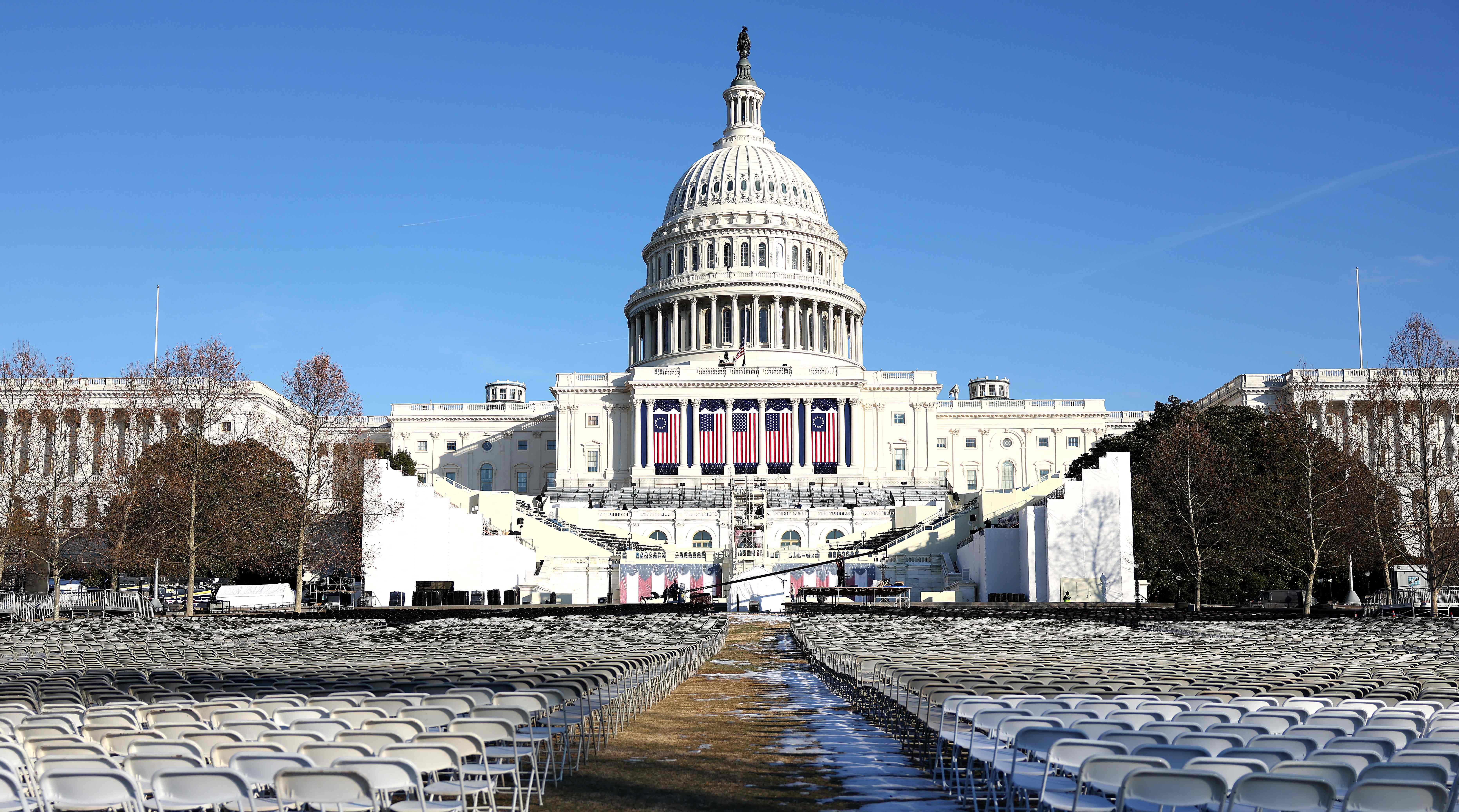WASHINGTON, DC - JANUARY 17: Chairs are setup on the National Mall in front of the U.S. Capitol January 17, 2025 in Washington, DC. The second Trump inauguration ceremony on January 20 will be moved to the rotunda of the U.S. Capitol as temperatures are expected to be the coldest in forty years.   Kayla Bartkowski/Getty Images/AFP (Photo by Kayla Bartkowski / GETTY IMAGES NORTH AMERICA / Getty Images via AFP)