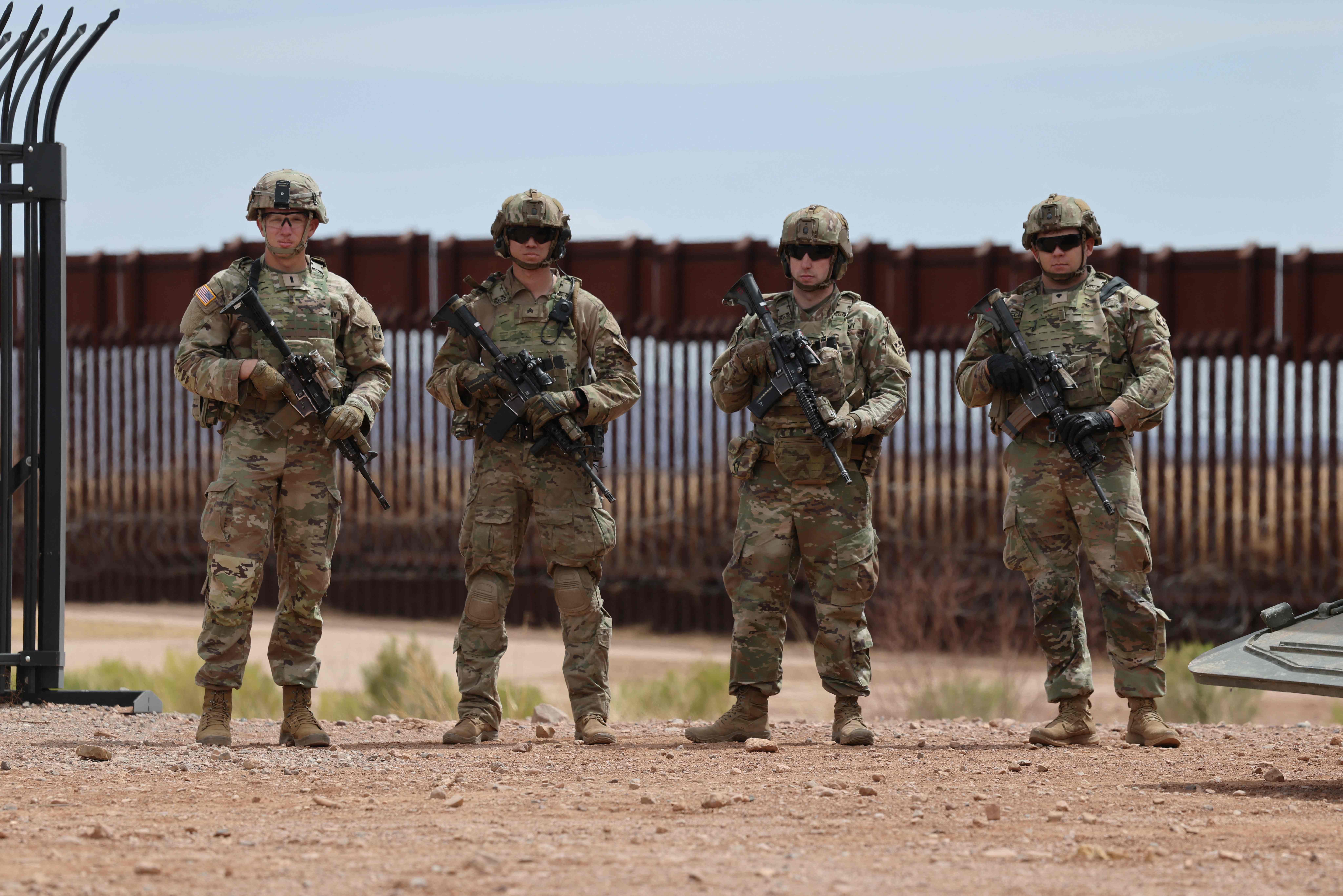 A Stryker platoon is stationed near the fence at the southern US border with Mexico, in Douglas, Arizona, on April 3, 2025. (Photo by David Swanson / AFP)