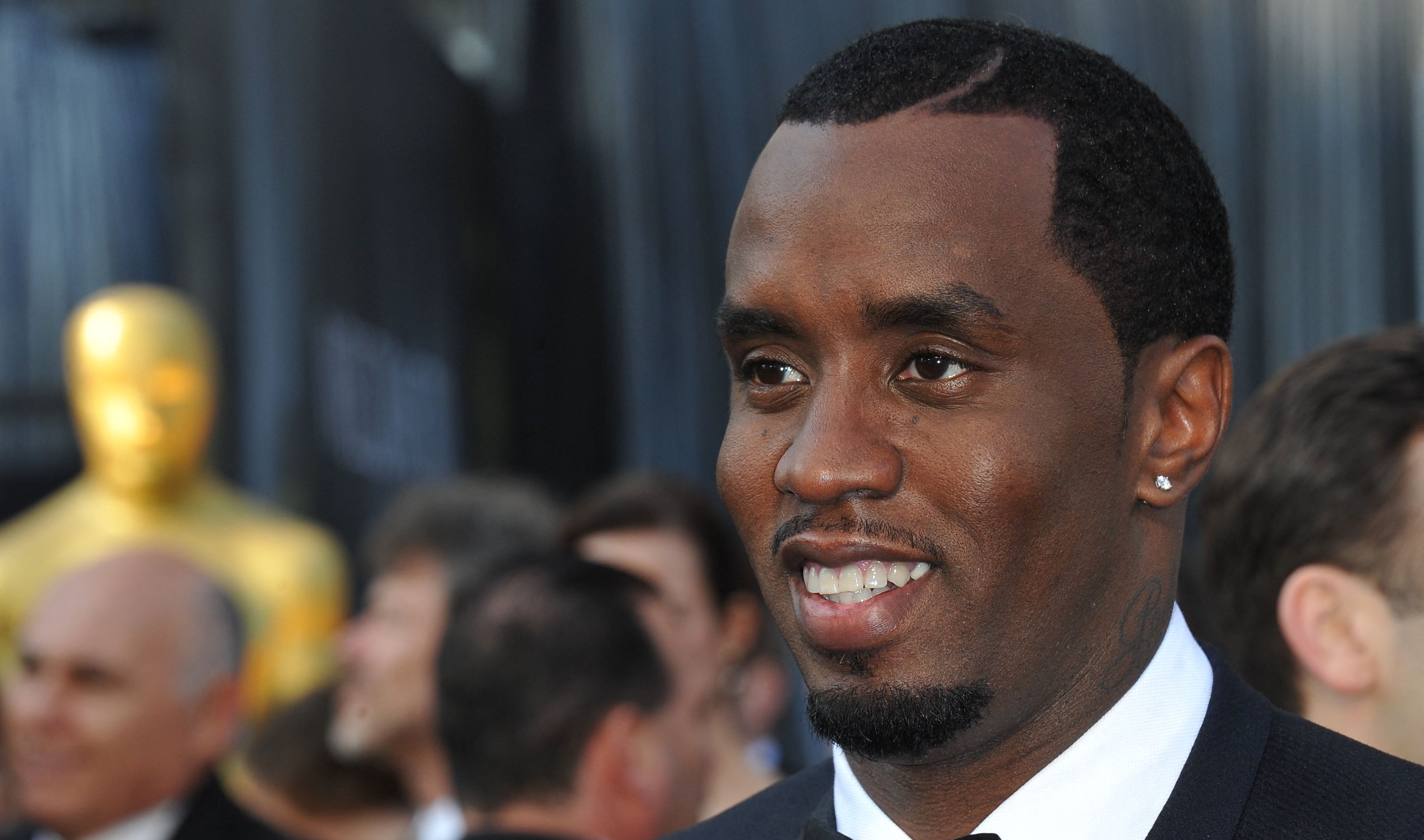 (FILES) US producer-musician Sean "Diddy" Combs arrives on the red carpet for the 84th Annual Academy Awards on February 26, 2012 in Hollywood, California. AFP PHOTO Joe KLAMAR. US prosecutors have added two charges to the criminal racketeering and sex trafficking case against Combs, according to a grand jury indictment unsealed on April 4, 2025. The superseding indictment includes an additional charge of sex trafficking and an additional charge of transportation to engage in prostitution, relating to a woman identified by prosecutors only as "Victim-2." (Photo by Joe KLAMAR / AFP)