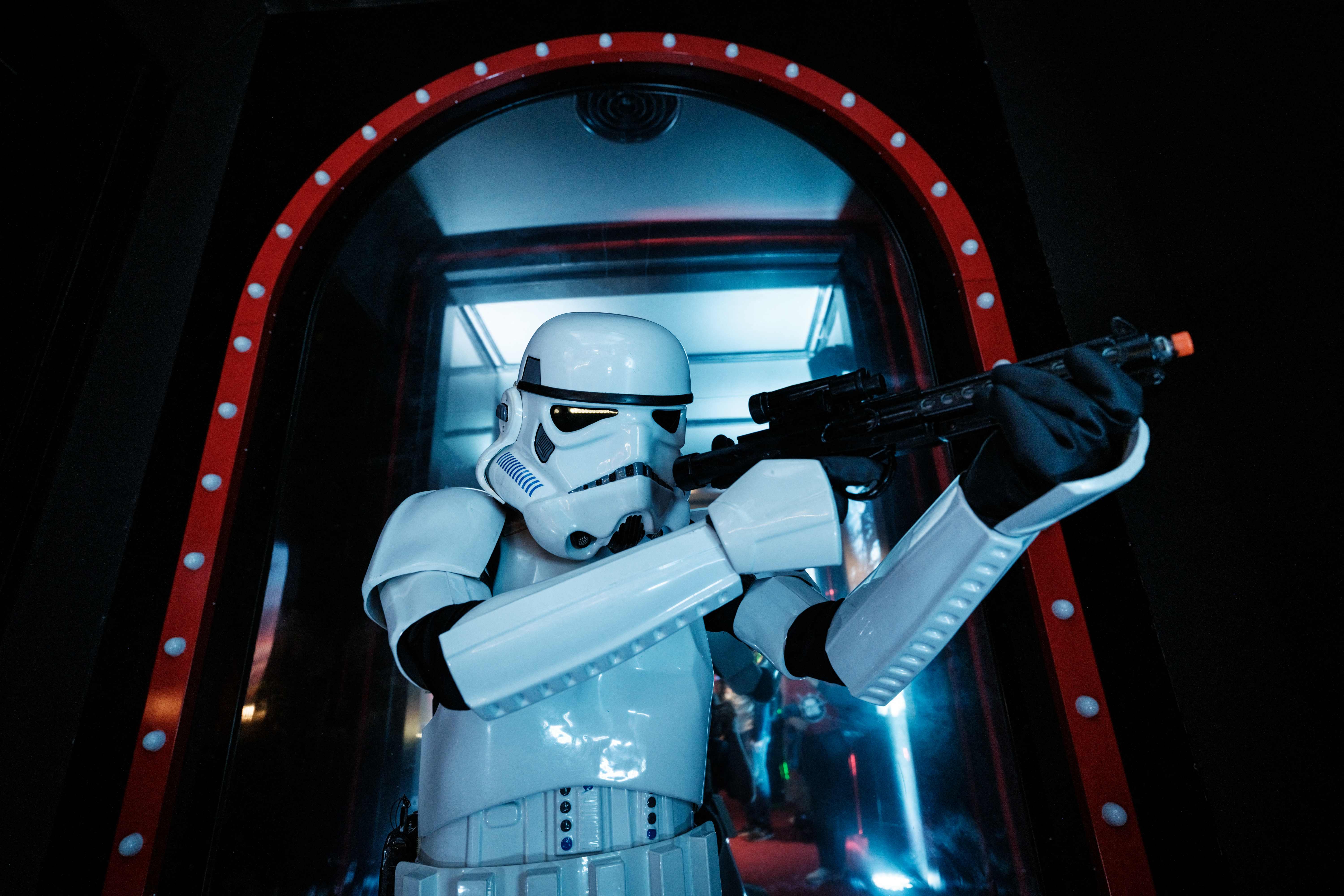 A fan dressed as a Stormtrooper poses during a fan event celebrating Star Wars Day, an unofficial global fan event held annually on a date chosen as a pun on the legendary sci-fi movie series iconic line, May the Force be with you, in Jakarta on May 4, 2025. (Photo by YASUYOSHI CHIBA / AFP)