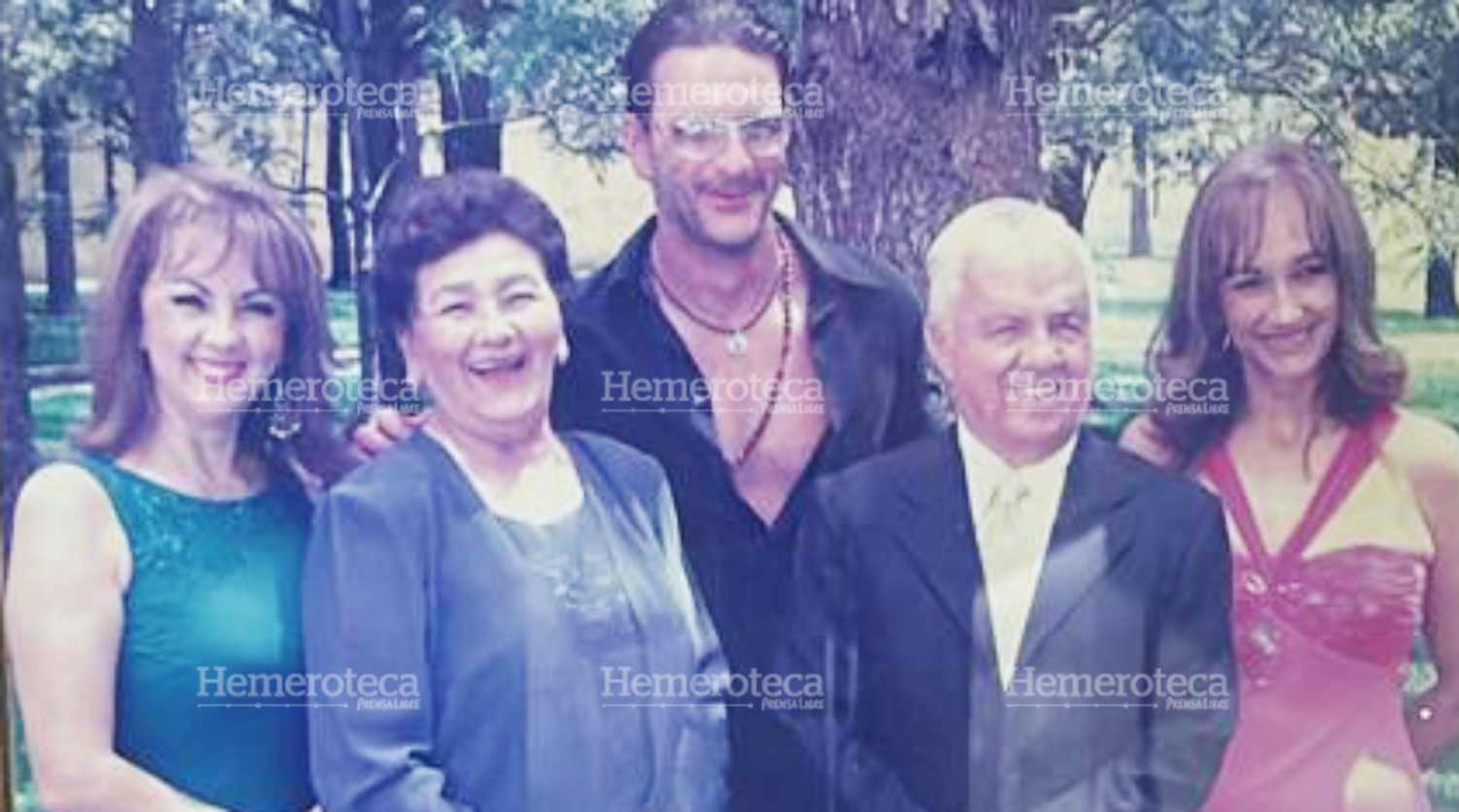 Ricardo Arjona y familia