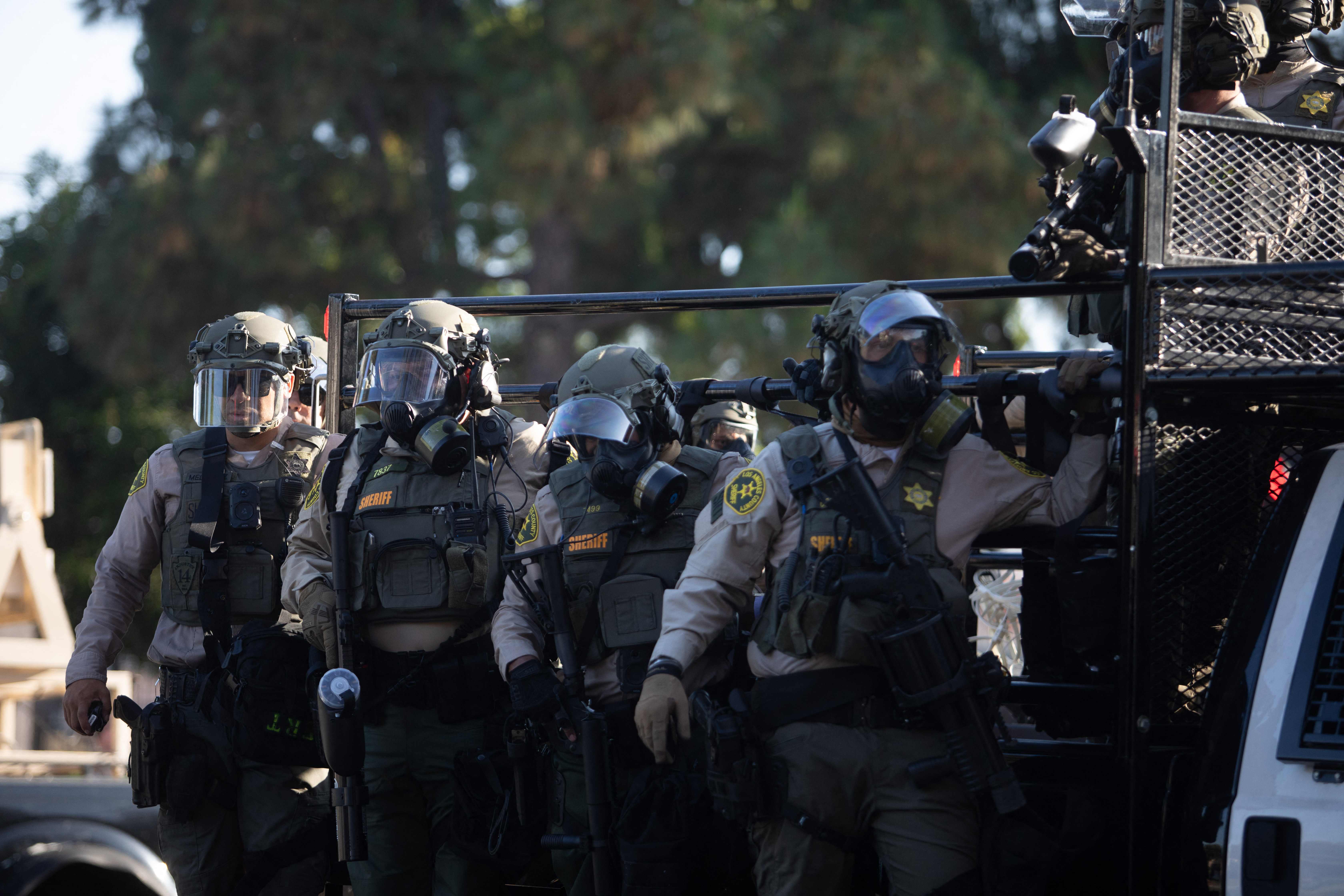 LOS ANGELES, CALIFORNIA - JUNE 07: Los Angeles Sheriff Department officers arrive to help on June 7, 2025 in Paramount, California. Clashes between the U.S. Border Patrol and protestors began after a Home Depot was raided by Immigration and Customs Enforcement (ICE). Around 30 agents wearing tactical gear were stationed near a Home Depot in Paramount and faced off against protesters, south of downtown Los Angeles.  Apu Gomes/Getty Images/AFP (Photo by Apu Gomes / GETTY IMAGES NORTH AMERICA / Getty Images via AFP)