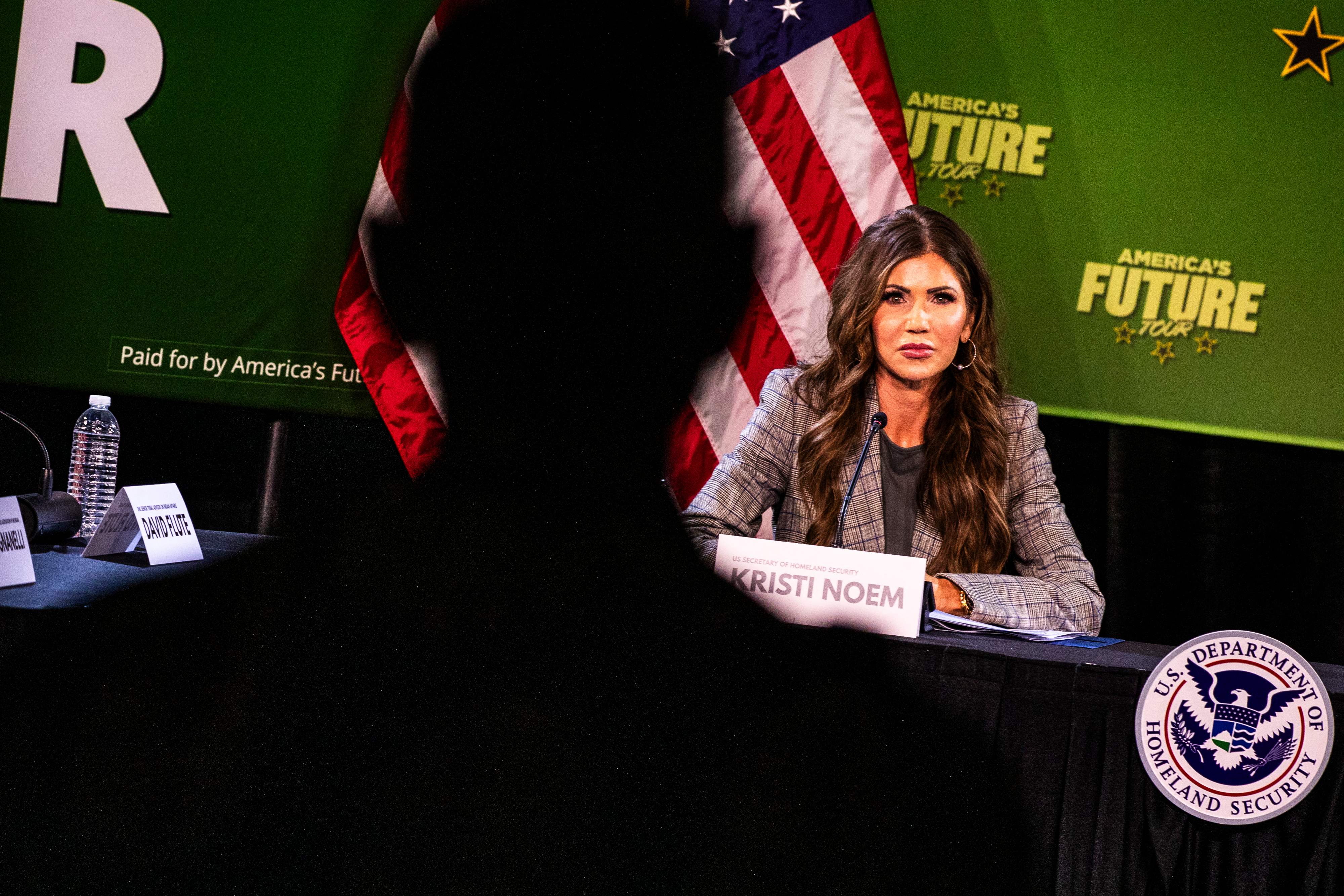 DETROIT, MICHIGAN - JUNE 20: Department of Homeland Security Secretary Kristi Noem listens to a question from an attendee during a policy event addressing concerns about the Canadian Northern Border on June 20, 2025 in Detroit, Michigan.In April 2025, U.S. Border Patrol apprehended 4,835 individuals attempting to cross the border illegally from Canada, down from a high of nearly 19,000 in August 2024, highlighting a sharp post-election slowdown in northern migration.   Emily Elconin/Getty Images/AFP (Photo by Emily Elconin / GETTY IMAGES NORTH AMERICA / Getty Images via AFP)