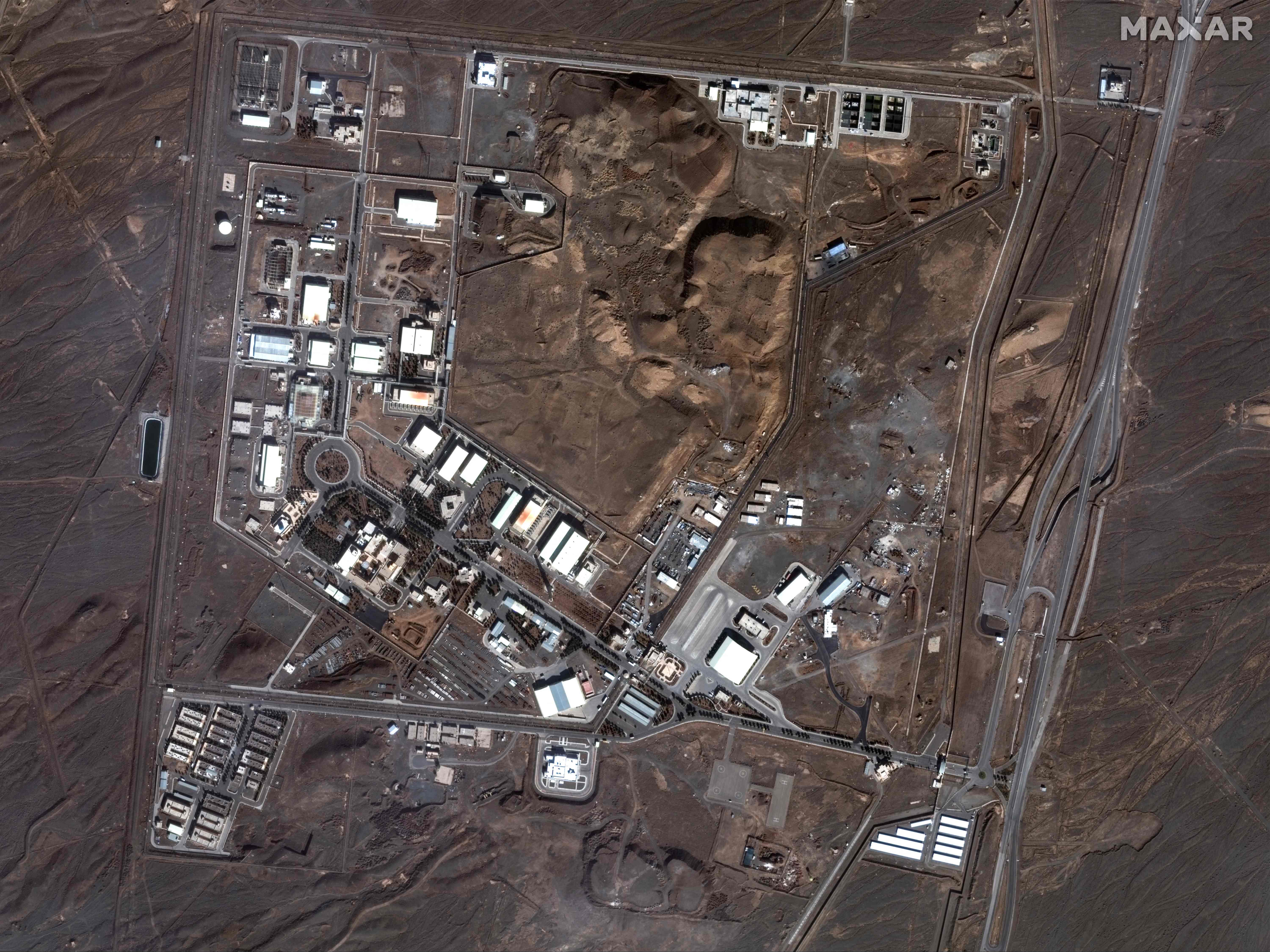 (FILES) This handout satellite image provided by Maxar Technologies shows the Natanz nuclear enrichment facility in central Iran on January 24, 2025. President Donald Trump said June 21, 2025 the US military has carried out a "very successful attack" on three Iranian nuclear sites, including the underground uranium enrichment facility at Fordo. "We have completed our very successful attack on the three Nuclear sites in Iran, including Fordow, Natanz, and Esfahan," Trump said in a post on his Truth Social platform. (Photo by Satellite image ©2025 Maxar Technologies / AFP) / RESTRICTED TO EDITORIAL USE - MANDATORY CREDIT "AFP PHOTO / Satellite image ©2025 Maxar Technologies " - NO MARKETING NO ADVERTISING CAMPAIGNS - DISTRIBUTED AS A SERVICE TO CLIENTS