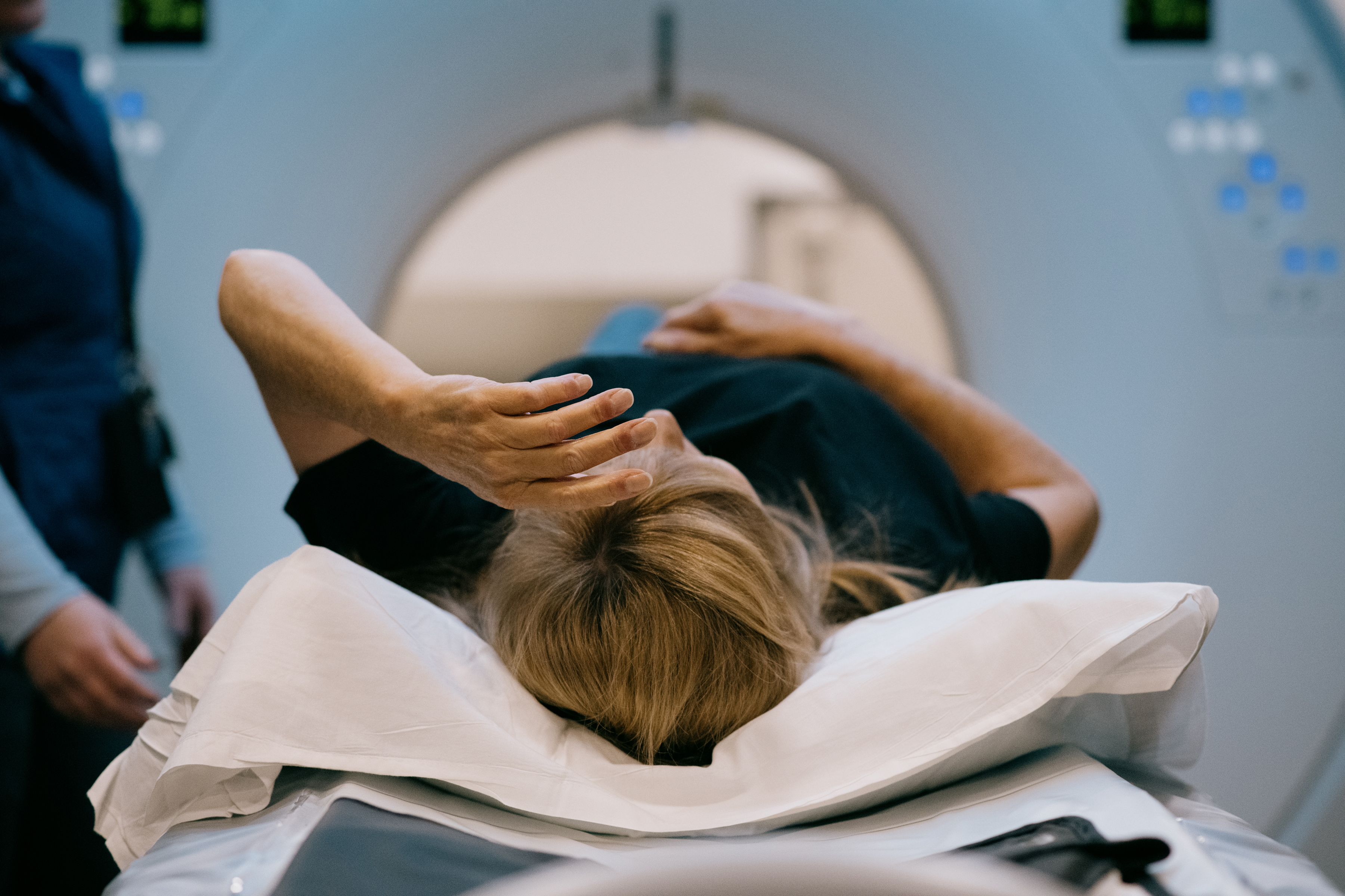 FILE — A patient receives a CT scan in Thomas, W.V., April 10, 2024. Screening can be a powerful weapon against cancer, helping catch some tumors months, or even years, before a person would feel sick enough to see a doctor. (Kristian Thacker/The New York Times)