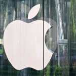 (FILES) The Apple logo is seen at a mall in the financial district of Shanghai on April 14, 2025. Apple will invest an additional $100 billion in the United States, taking its total pledge to $600 billion over the next four years, a senior White House official said August 6, 2025. The announcement, which was first reported by US media, will be officially made later Wednesday at 4:30 pm (2030 GMT) at a White House event with President Donald Trump. (Photo by Hector RETAMAL / AFP)