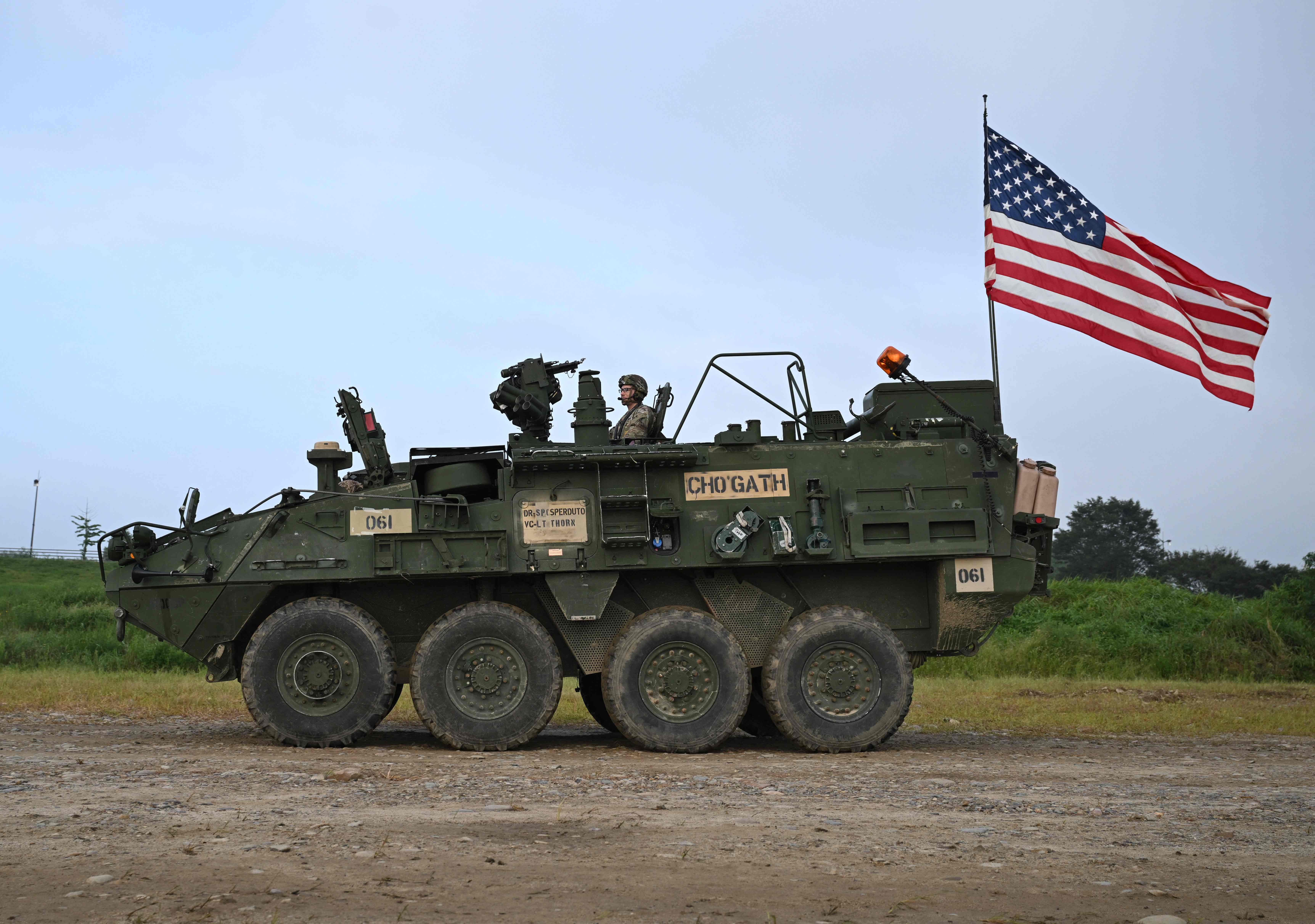 A US Stryker infantry carrier vehicle moves to cross a river over a floating bridge during a South Korea-US joint river-crossing drill as part of the annual Ulchi Freedom Shield military exercise in Yeoju on August 27, 2025. (Photo by Jung Yeon-je / AFP)