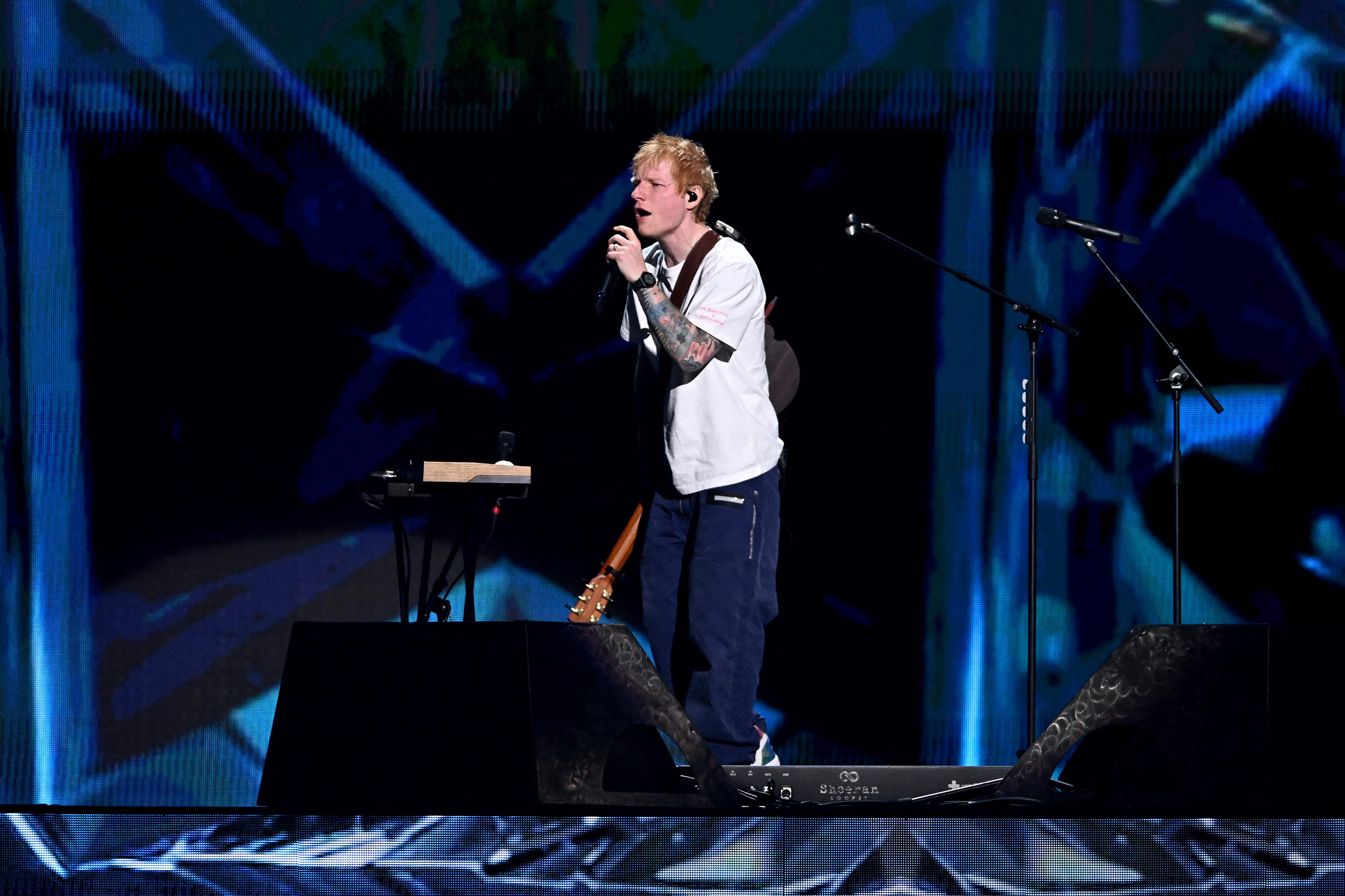 LAS VEGAS, NEVADA - SEPTEMBER 20: Ed Sheeran performs onstage during the 2025 iHeartRadio Music Festival at T-Mobile Arena on September 20, 2025 in Las Vegas, Nevada. Bryan Steffy/Getty Images/AFP (Photo by Bryan Steffy / GETTY IMAGES NORTH AMERICA / Getty Images via AFP)