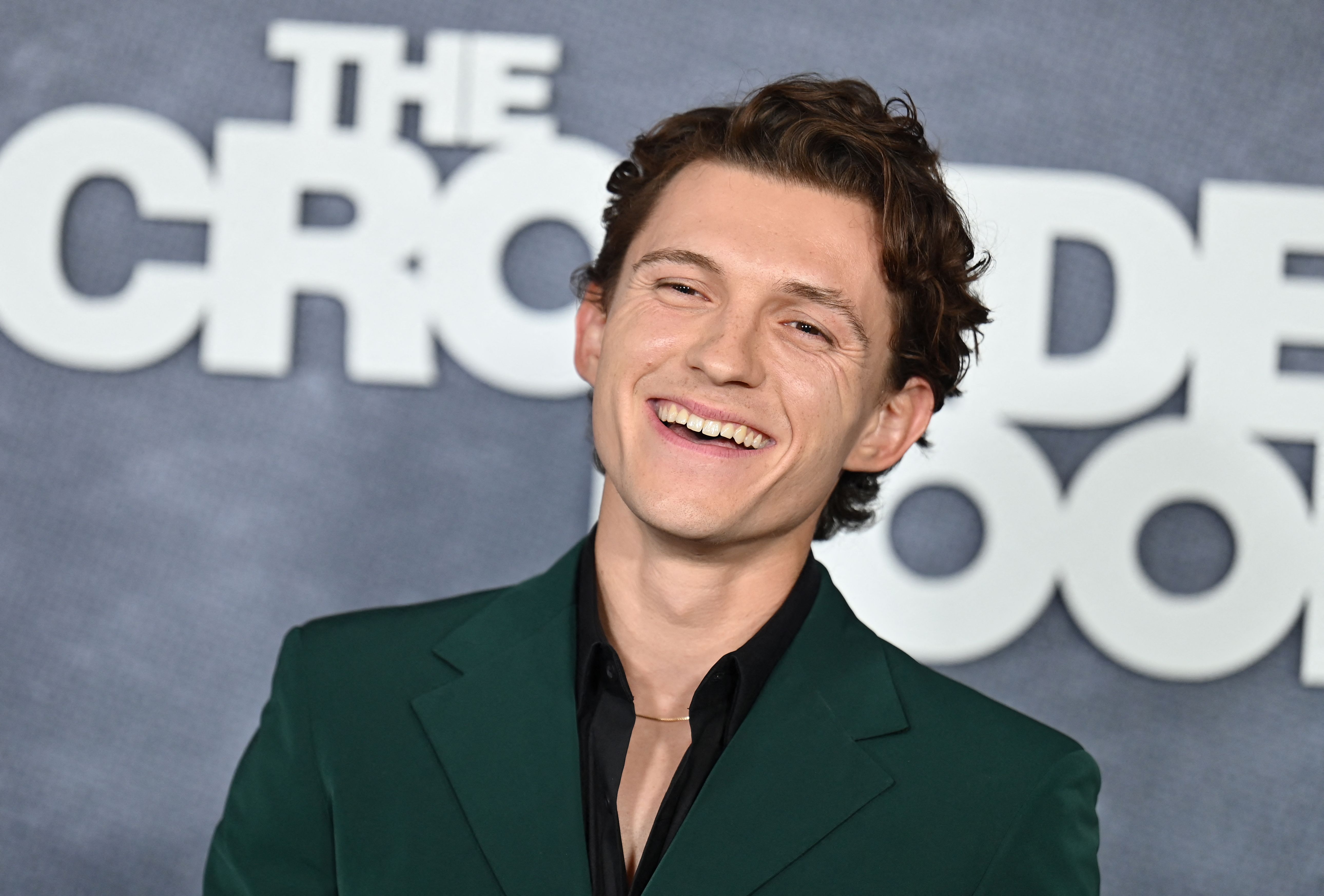 (FILES) British actor Tom Holland arrives for the premiere of Apple TV+'s "The Crowded Room" at the Museum of Modern Art in New York City on June 1, 2023. With "The Odyssey" and a new "Spider-Man" film, next summer looks set to be the summer of Tom Holland -- and the famously boyish and ebullient star can hardly contain his excitement. (Photo by ANGELA WEISS / AFP)