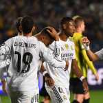 Real Madrid's French forward #10 Kylian Mbappe (C) celebrates with his teammates after scoring the 0-1 goal during the UEFA Champions League first round day 2 football match between Kairat Almaty and Real Madrid at the Almaty Ortalyk stadion in Almaty on September 30, 2025. (Photo by Vyacheslav OSELEDKO / AFP)