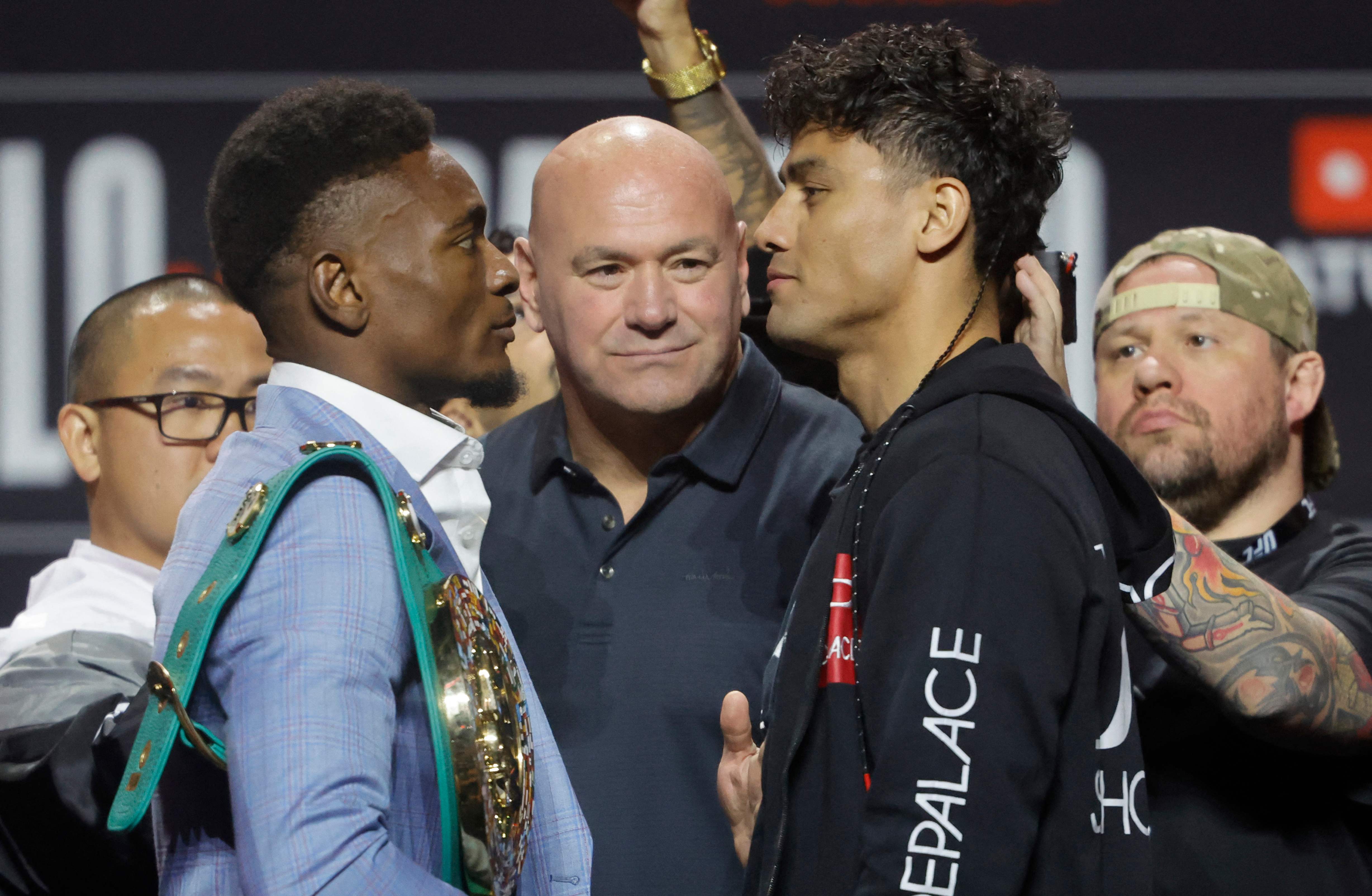 LAS VEGAS, NEVADA - SEPTEMBER 11: WBC super middleweight interim champion Christian Mbilli (L) and Lester Martinez face off during a news conference at T-Mobile Arena on September 11, 2025 in Las Vegas, Nevada. Dana White looks on at center. The undefeated boxers are scheduled to fight on the Canelo Alvarez-Terence Crawford undercard on September 13, 2025, at Allegiant Stadium in Las Vegas.   Steve Marcus/Getty Images/AFP (Photo by Steve Marcus / GETTY IMAGES NORTH AMERICA / Getty Images via AFP)