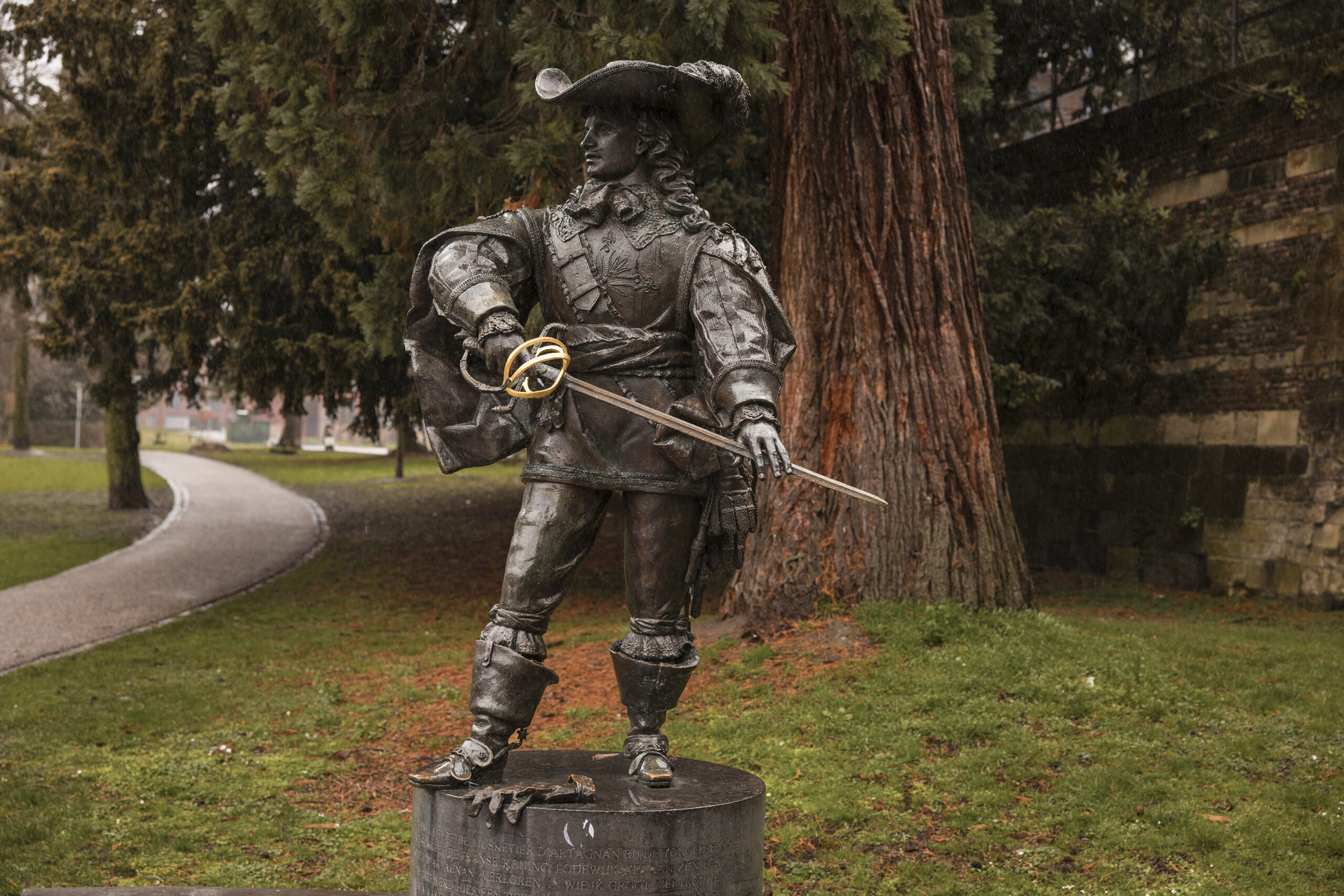 A statue of d'Artagnan stands in a park in Wolder, which sits on the outskirts of Maastricht, Amsterdam on Feb. 22, 2026. Wolder, near the Belgian border, is waiting to see if the skeleton it dug up in a church is Count d'Artagnan, from Alexandre Dumas's tale. (Ilvy Njiokiktjien/The New York Times)