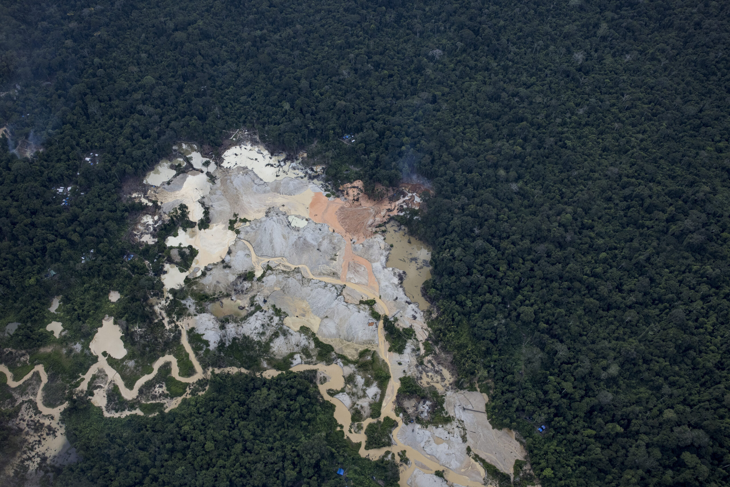 FILE Ñ An illegal mine in the protected land of the Yanomami people in the Amazon, in Roraima state, Brazil, May 14, 2022. Global demand for critical minerals, used to build drones and electric cars, is surging, setting off a new wave of criminality in the worldÕs largest rainforest. (Victor Moriyama/The New York Times)
