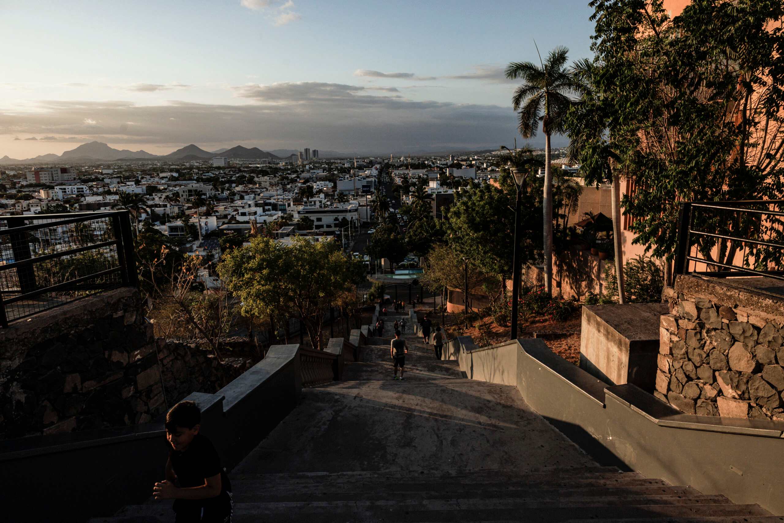 FILE Ñ Residents at La Lomita, an iconic church and viewpoint with panoramic city views in Culiacn, Sinaloa, Mexico, June 10, 2025. The Trump administration wants President Claudia Sheinbaum to arrest a Mexican governor. She is faced with few good options in response. (Adriana Zehbrauskas/The New York Times)