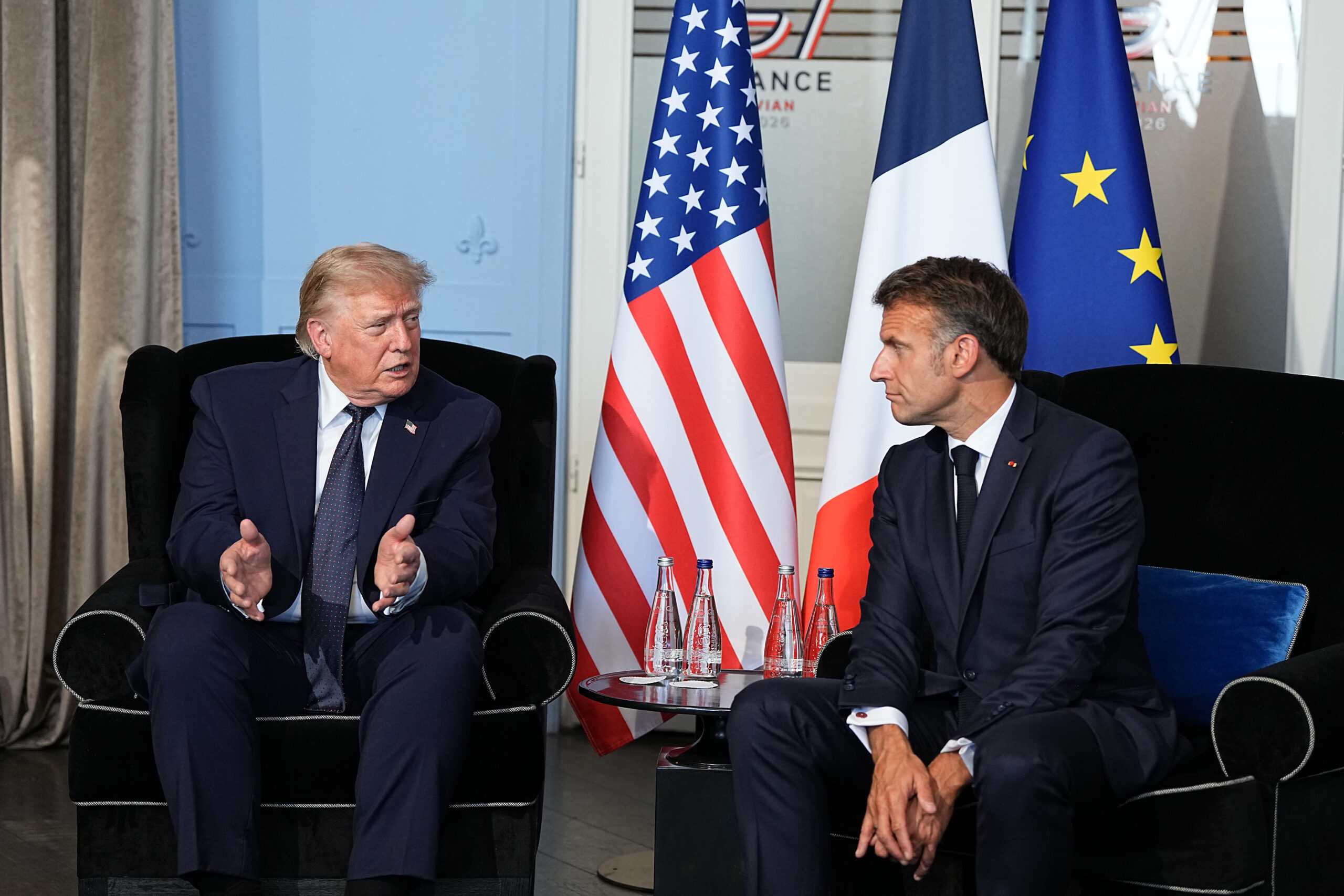 President Donald Trump, left, meets with President Emmanuel Macron of France in Evian-les-Bains, France, on Monday, June 15, 2026. European nations are poised to send ships into the Strait of Hormuz to protect shipping -- but not until they are convinced that the new cease-fire between the United States and Iran is working. (Haiyun Jiang/The New York Times)