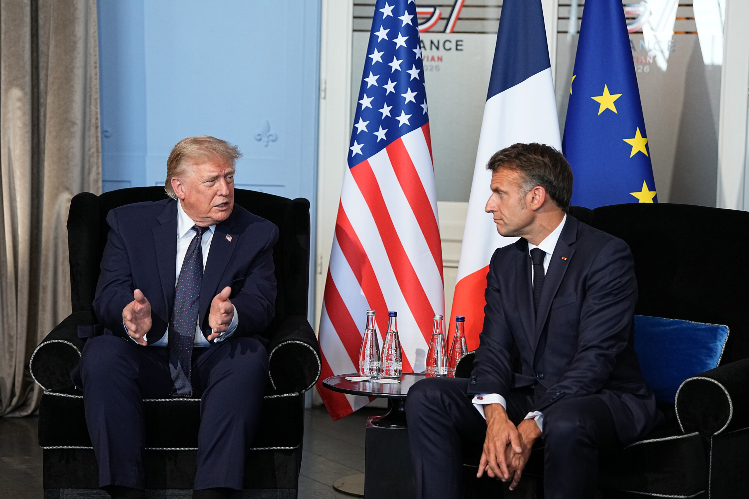 President Donald Trump, left, meets with President Emmanuel Macron of France in Evian-les-Bains, France, on Monday, June 15, 2026. European nations are poised to send ships into the Strait of Hormuz to protect shipping -- but not until they are convinced that the new cease-fire between the United States and Iran is working. (Haiyun Jiang/The New York Times)