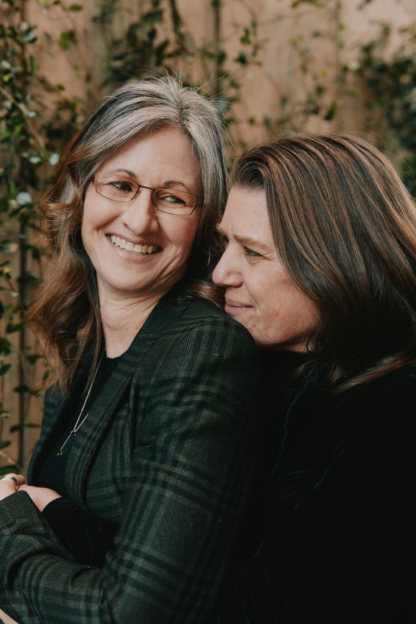 Mary Trump, right, the psychologist and a niece of the president, and Ronda Cress, a former Justice Department lawyer, in New York on Feb. 27, 2026. The couple had their first date in March 2025, and are now married. They both describe their relationship as "transformative," upending lives and arcs that both had seemingly resigned themselves to. (Alexandra Genova/The New York Times)..
