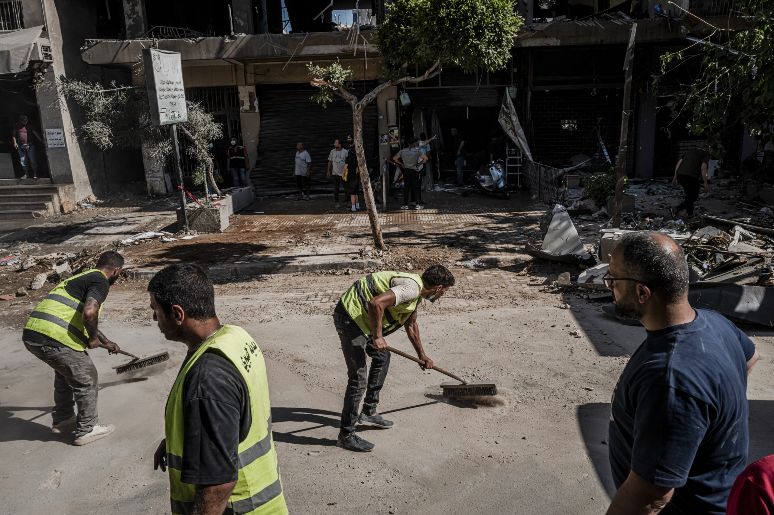 Workers at the scene of an Israeli airstrike in Beirut, Lebanon, on Sunday, June 14, 2026. The attack cast further doubt on whether the promised cease-fire deal would get signed. (Daniel Berehulak/The New York Times)