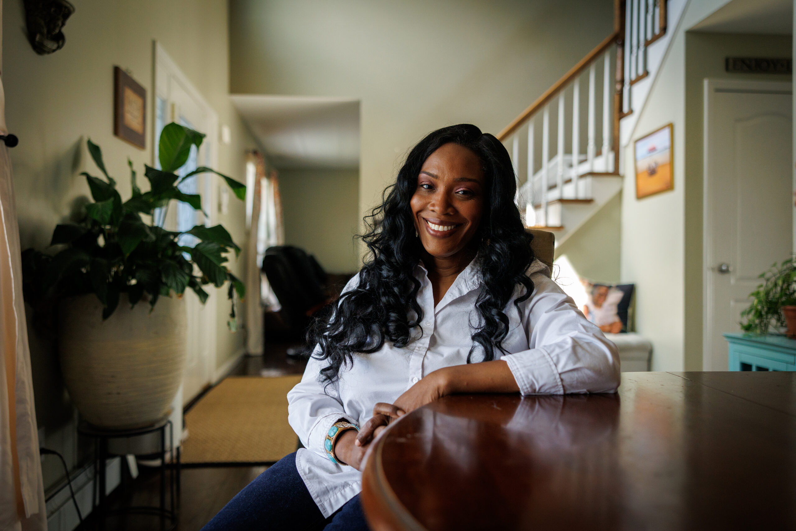 Sandy Smith, who said she embraced being cheap because she had to, at her home in Farmingdale, N.Y., May 28, 2026. Our spending habits are often influenced by our social circles. You can help shape what it looks like.(Benjamin Norman/The New York Times)