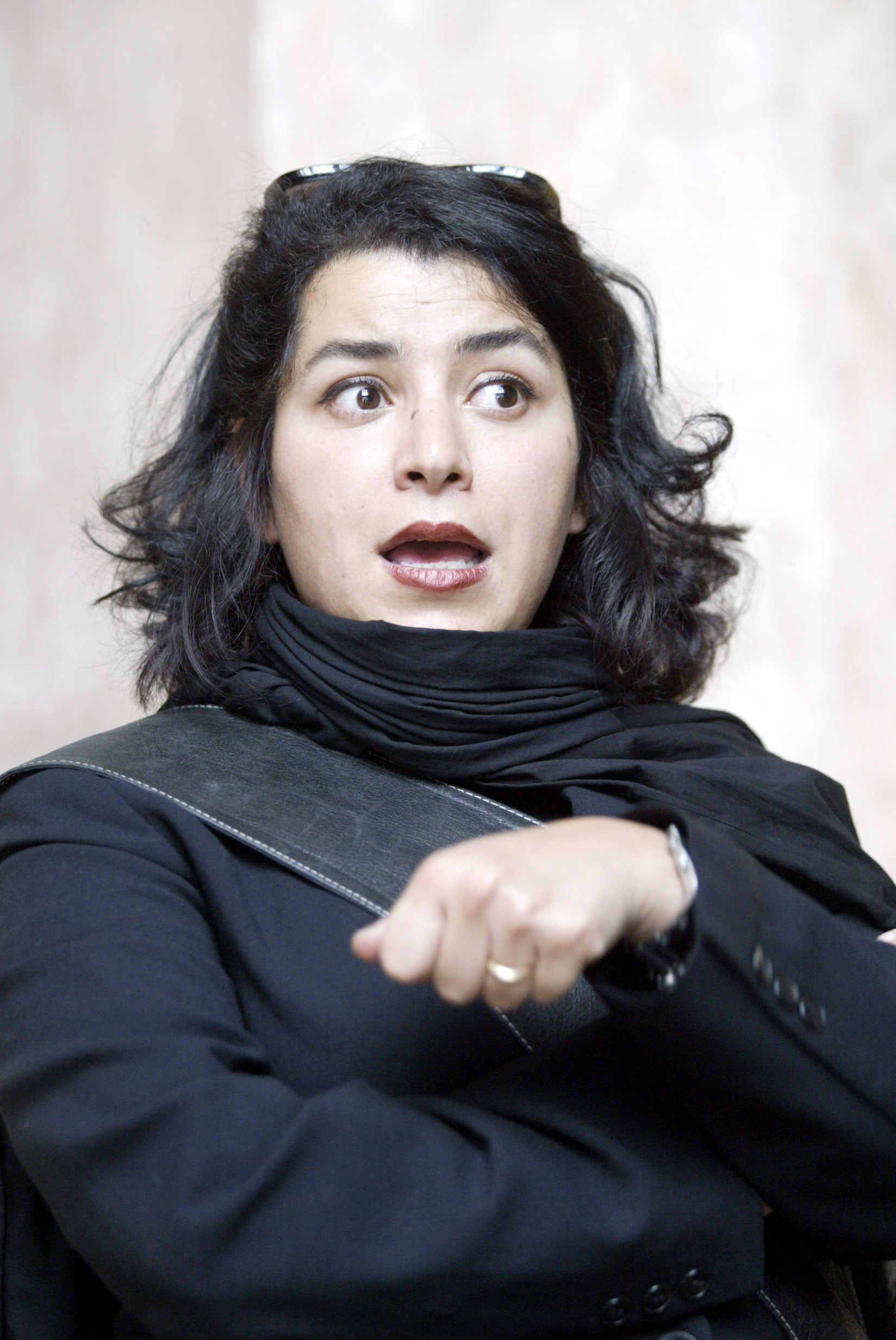 FILE -- Marjane Satrapi, the author of "Persepolis," in New York on May 15, 2003. Satrapi, whose graphic novel series "Persepolis" introduced millions of readers to the struggles of ordinary Iranians during the turbulent years around the Islamic Revolution, has died at 56, the office of President Emmanuel Macron of France announced on June 4, 2026. (Librado Romero/The New York Times)..