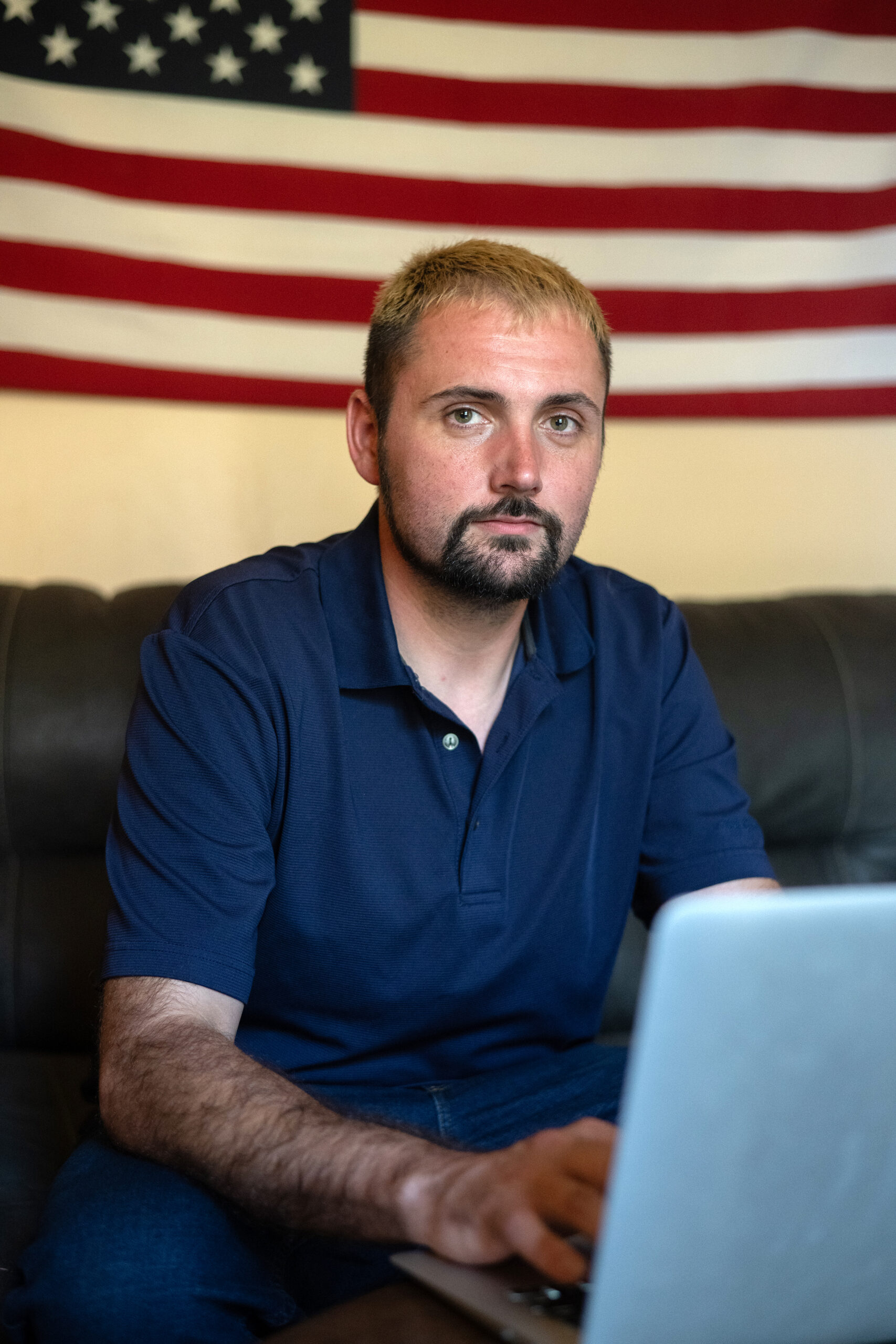 Dustin Lloyd, a Democratic primary candidate for Missouri's state legislature, at his home in Excelsior Springs, Mo., on July 14, 2026. Political campaigns have something new to worry about these days: unflattering or incomplete information produced by A.I. programs when voters ask questions about candidates. (Clayton Steward/The New York Times)