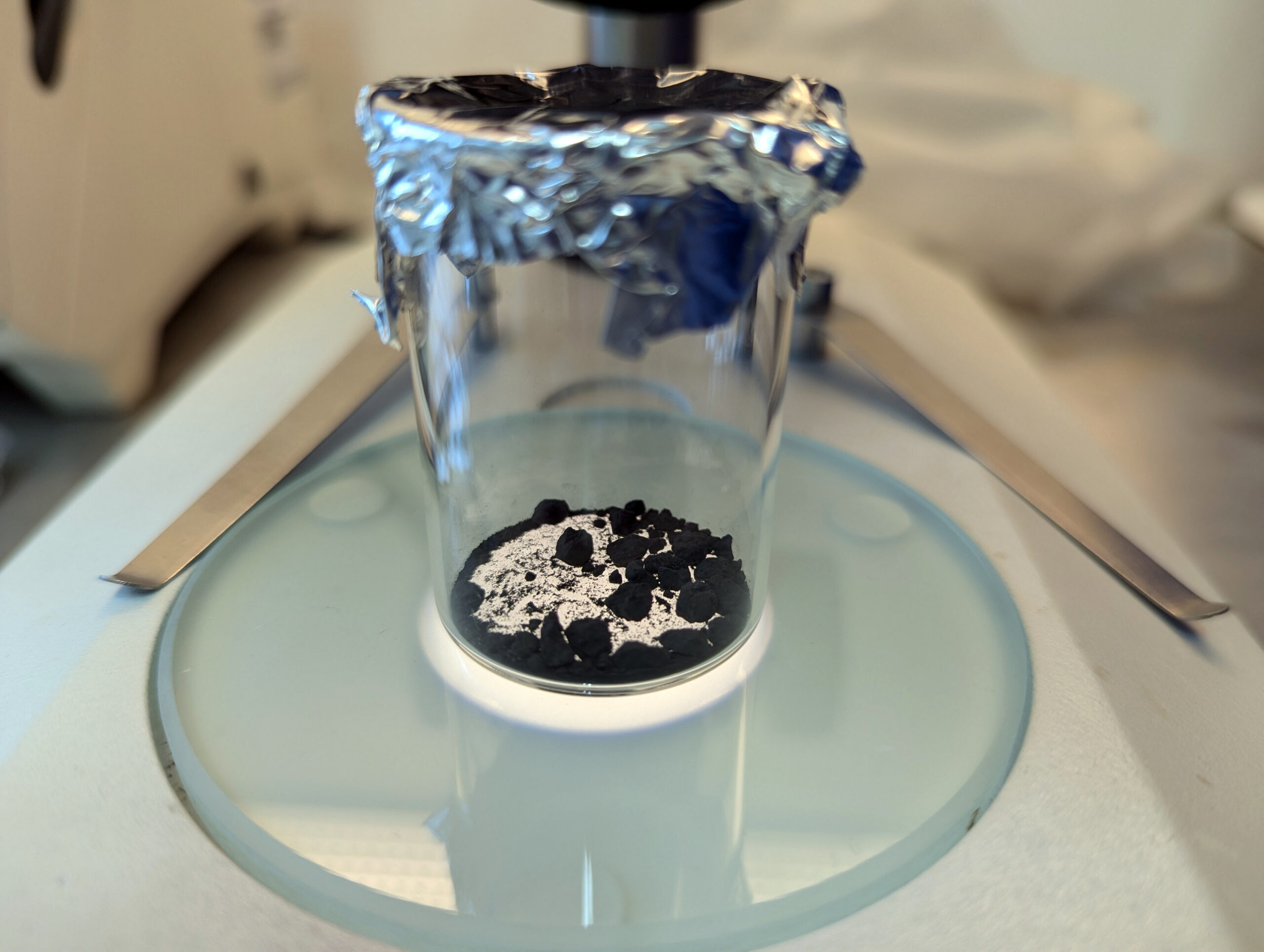 A handout photo shows a sample of the Hillsborough, N.J., meteorite at the Royal Holloway University in London. A New Jersey couple helped scientists uncover the makeup of an unusual asteroid after it fell into their bedroom. (Queenie Hoi Shan Chan via The New York Times) -- NO SALES; FOR EDITORIAL USE ONLY WITH NYT STORY SLUGGED ASTEROID HITS HOME BY ROBIN GEORGE ANDREWS FOR JULY 15, 2026. ALL OTHER USE PROHIBITED. --