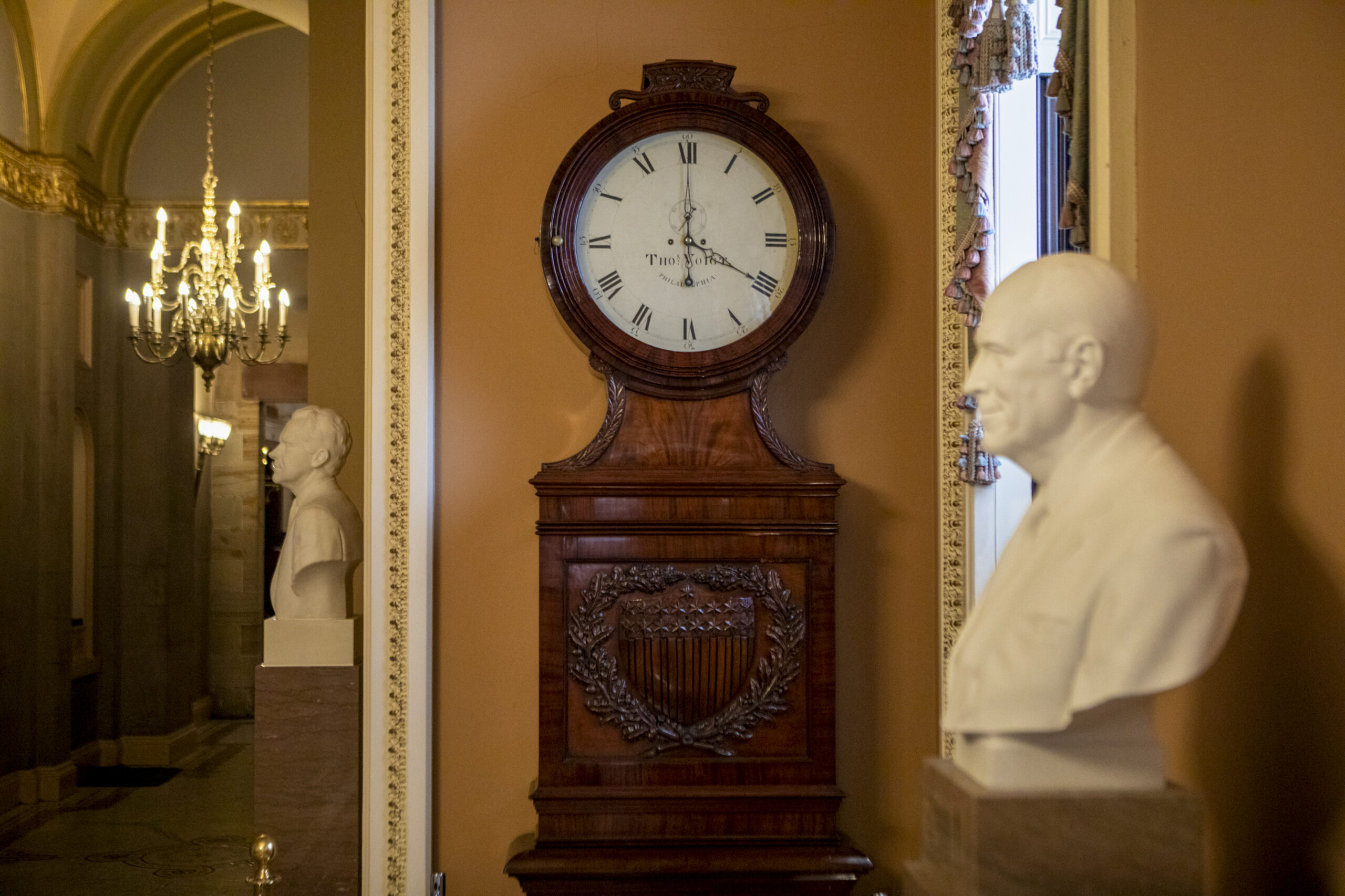 FILE -- A clock in a hallway of the U.S. Capitol in Washington, March 9, 2023. The House on Tuesday, July 14, 2026, voted overwhelmingly to make daylight saving time permanent, but the measure to spare Americans the semiannual clock-changing that shortens winter days faces an uncertain path to enactment. (Anna Rose Layden/The New York Times)