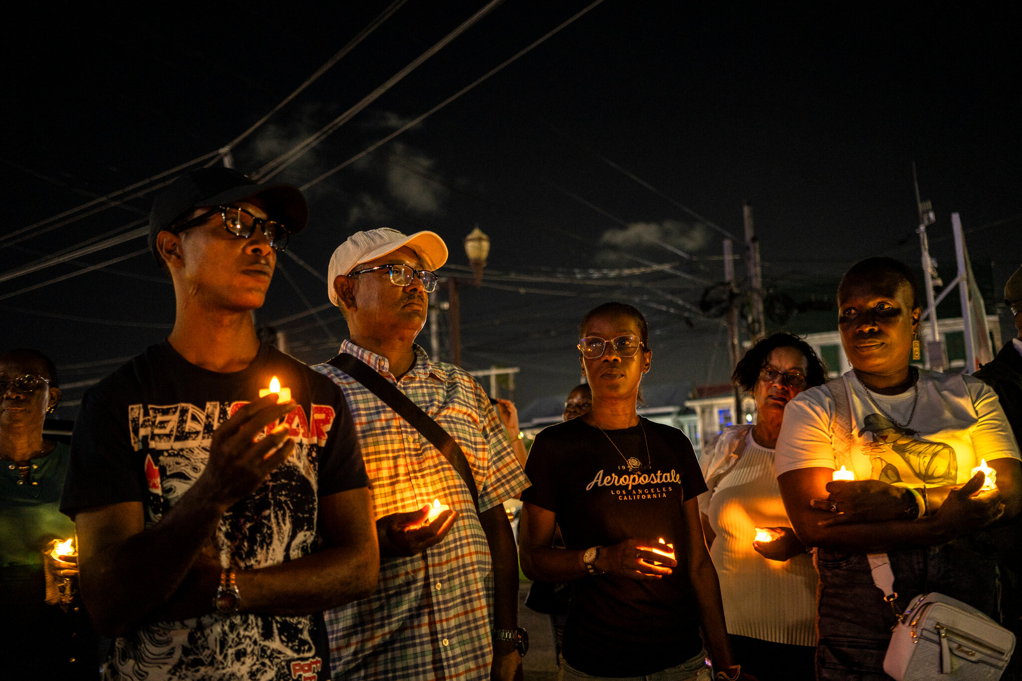 A vigil for people who died in ferry sinking this month in Georgetown, Guyana. Cesar Rodriguez for The New York Times
